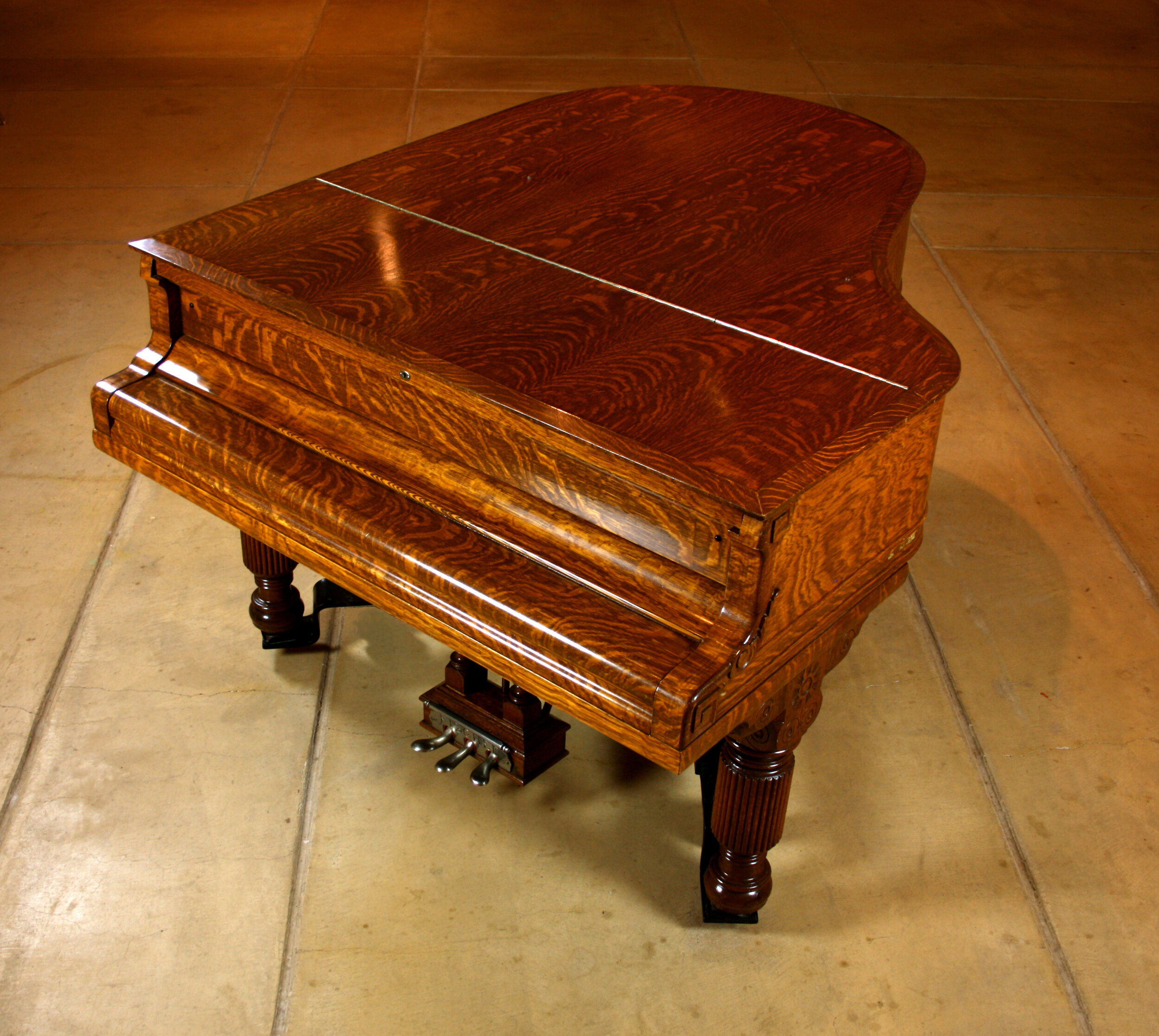 The Tiger Wood Piano — The Old Jail Art Center