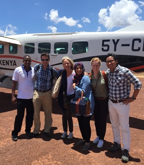 (Left to right) Ezekiel, the head of the Lewa Clinic greets Dr. Michael Hawkes, Stacy Francis, Dr. Sidiqa Rajani, Alex Friel and Dr. James Aw. 