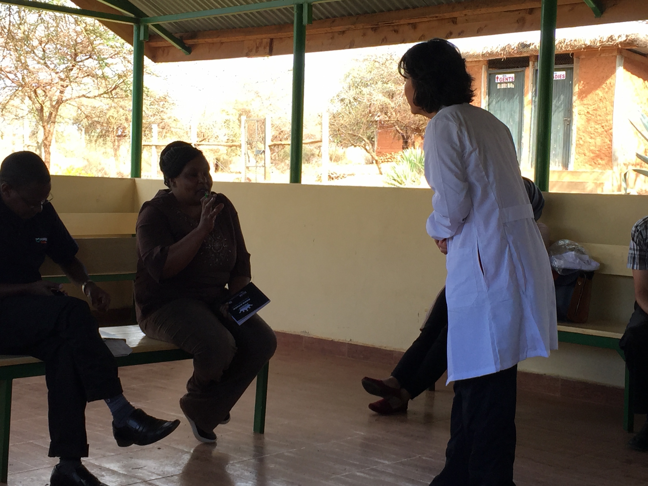 Dr. Sue answering a question from Faith, who will be Dr. Sue's partner over the next few days during the cervical cancer screenings. 