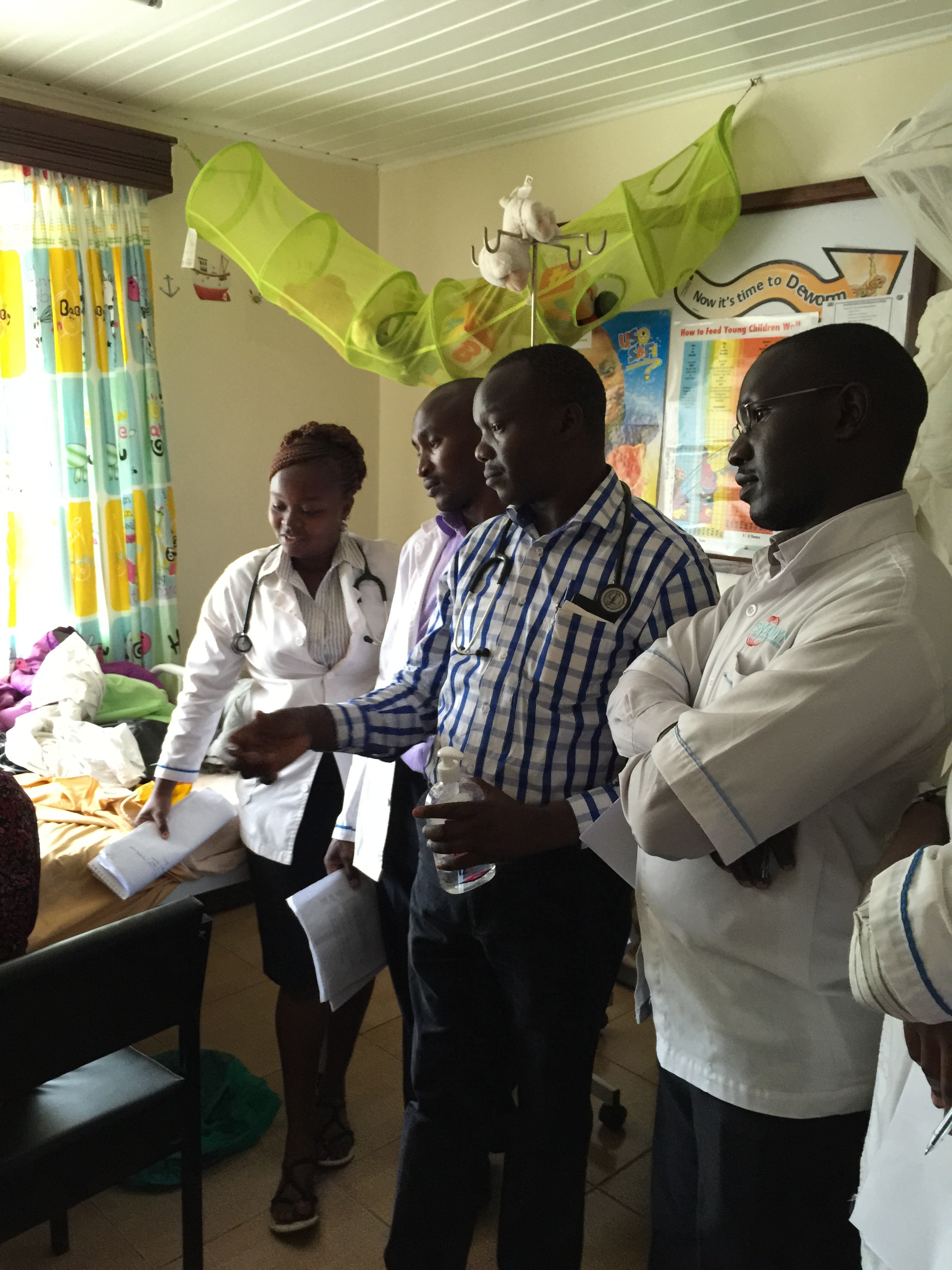 The Fluorspar clinic team presenting a case to Naweza doctors. 