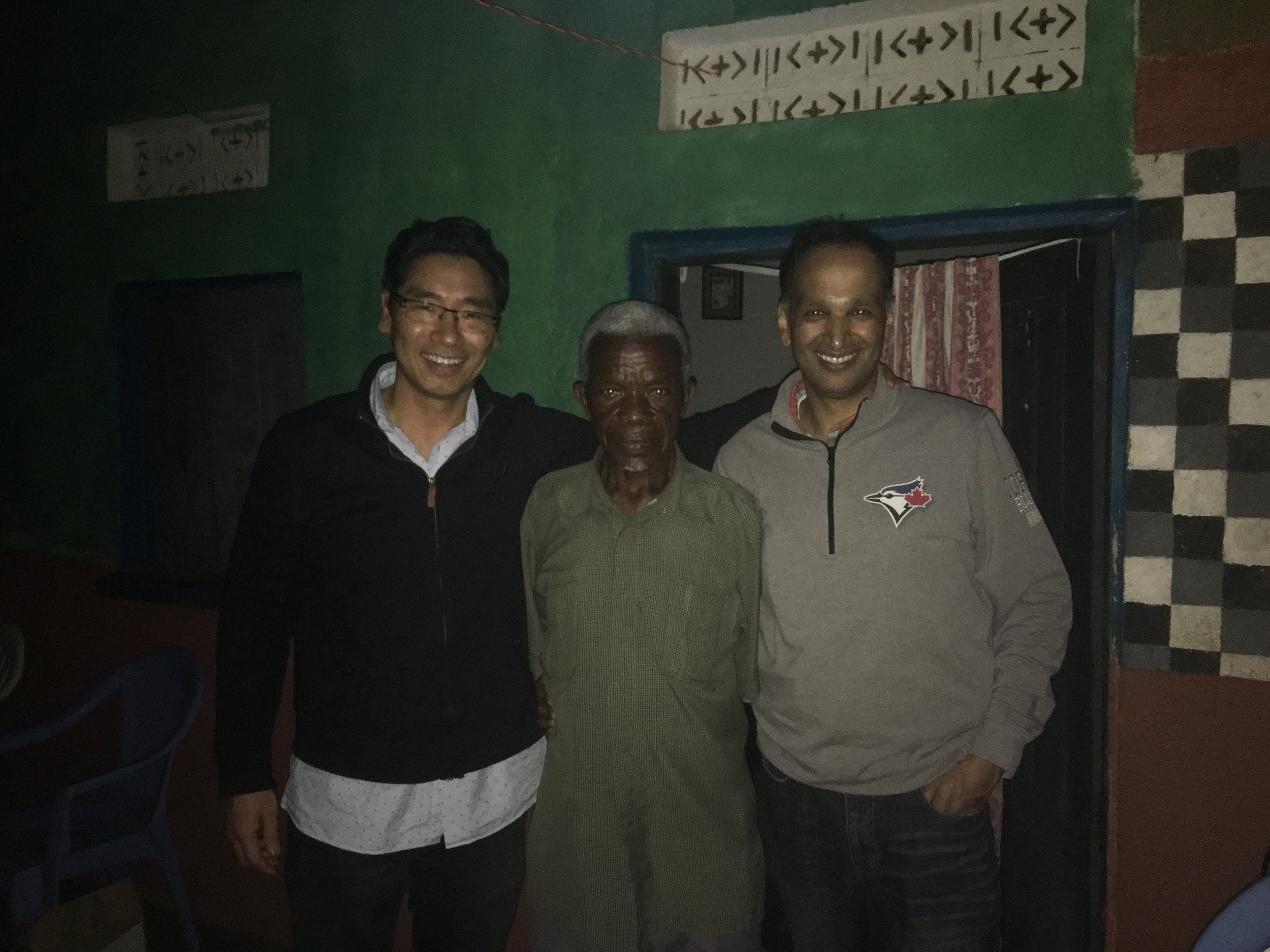 Dr. James and Dr. Rajiv with our host, John's father.