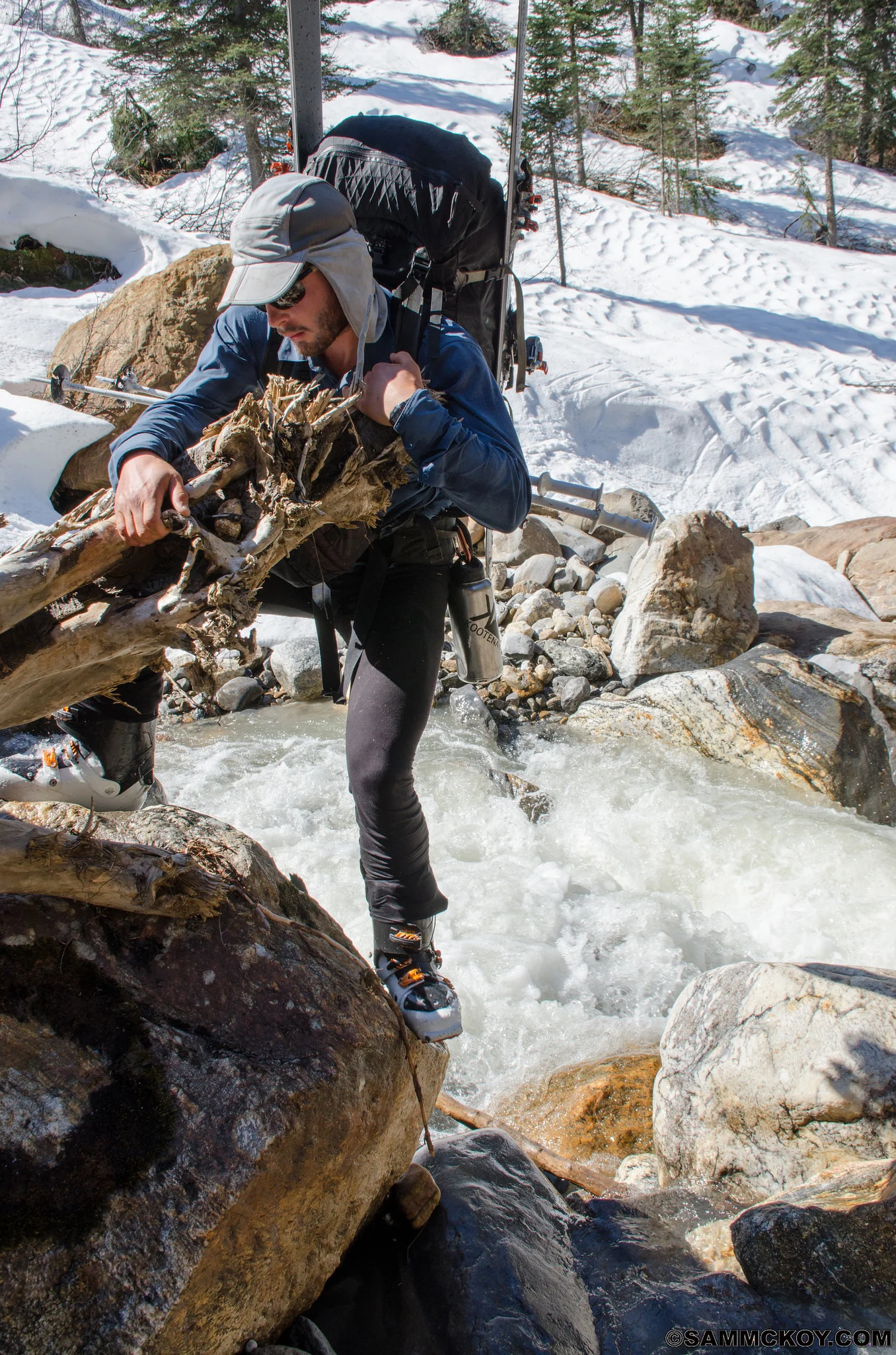 Douglas employing some gynastics to work out this crossing. Definitely not all skiing on a ski traverse.