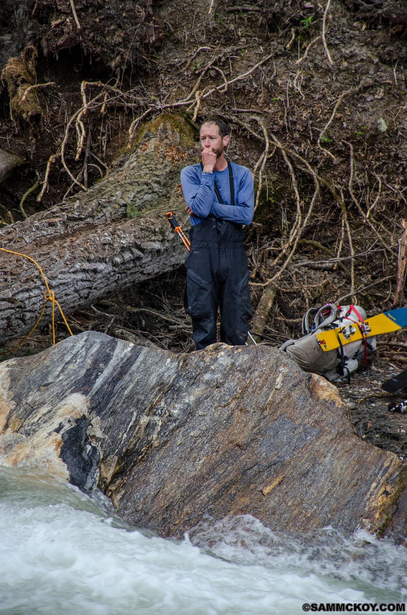 Mark observing as Madeleine cross the log. 