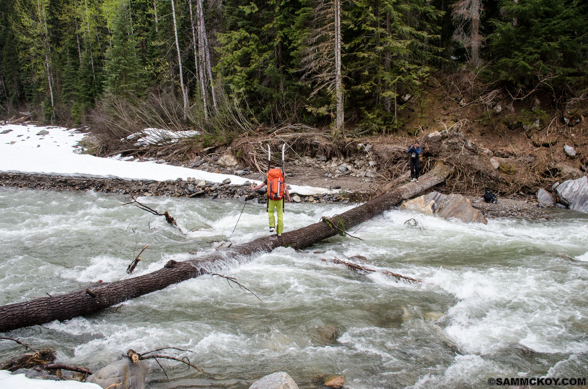 Steve a little past midway across the span of Windy Creek. Here he uses a probe for lateral support. 