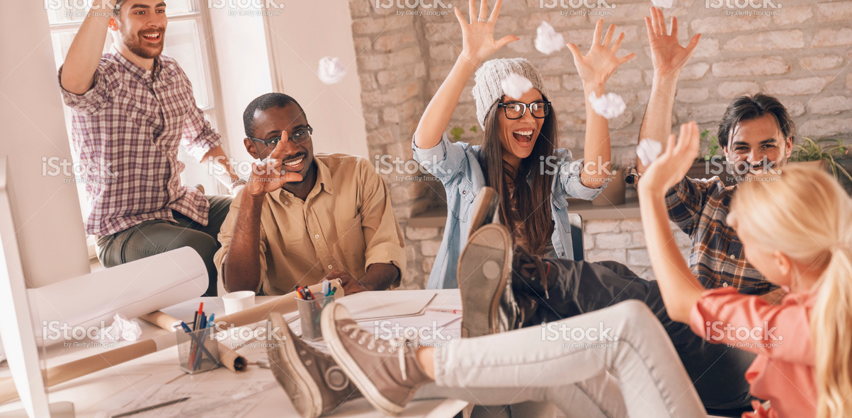 Group of smiling playfully designers relaxing stock photo 37905230 - iStock 2015-06-27 11-49-35.png