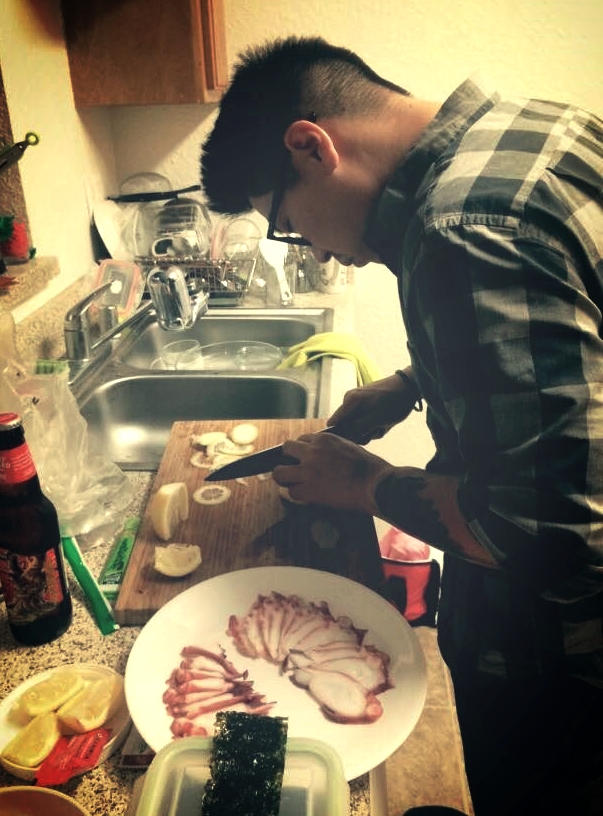 Slicing some octopus (thank you octopus for being so delicious) 