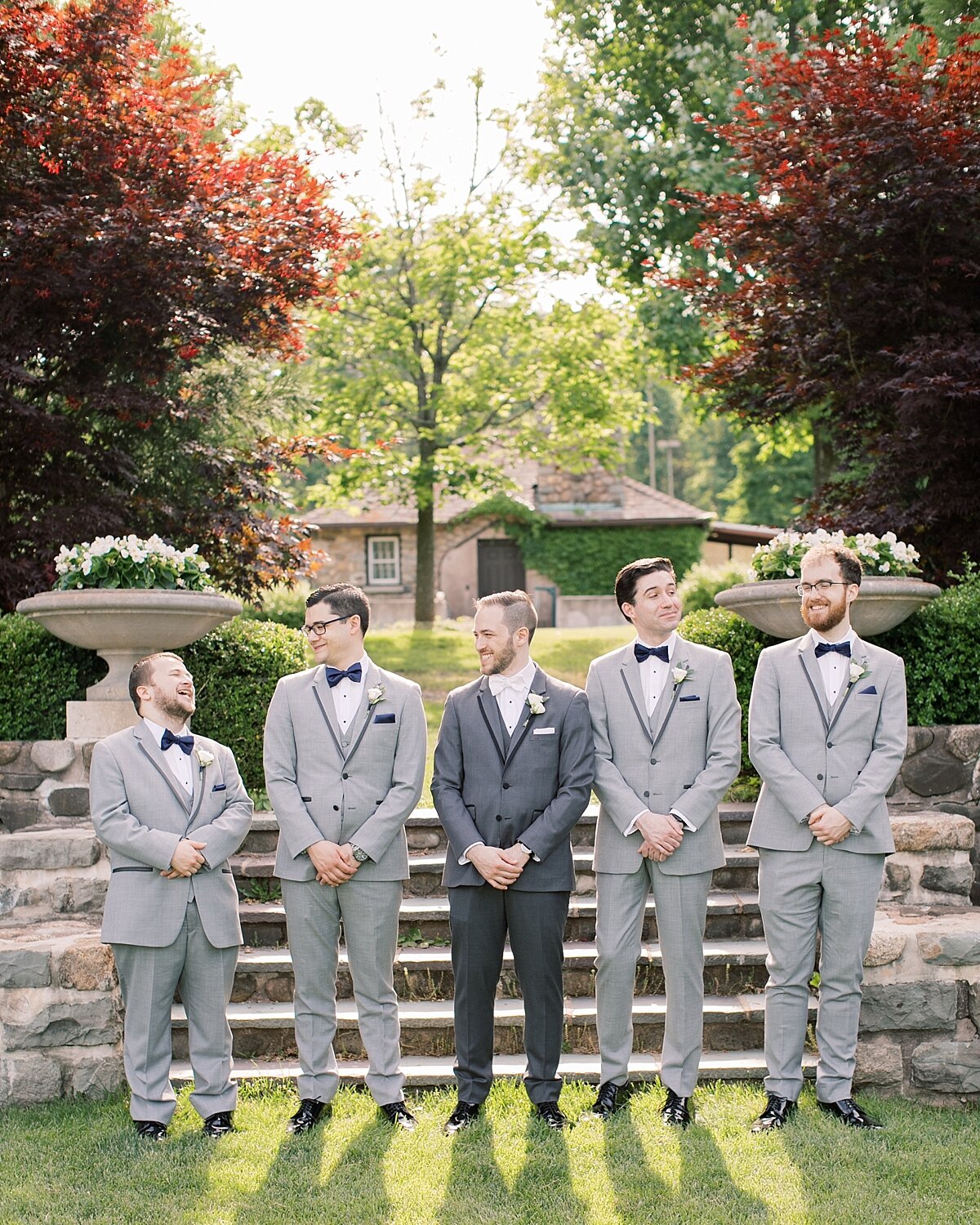 groomsmen pose for Asher Gardner Photography during Paramount Country Club photos