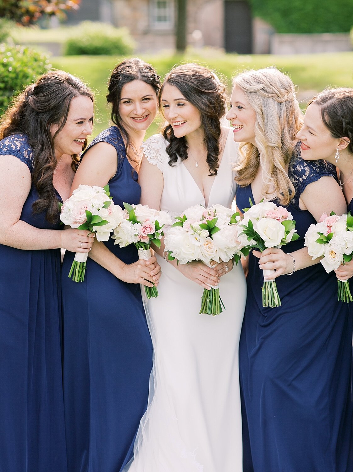 bridesmaids in navy dresses for New York wedding