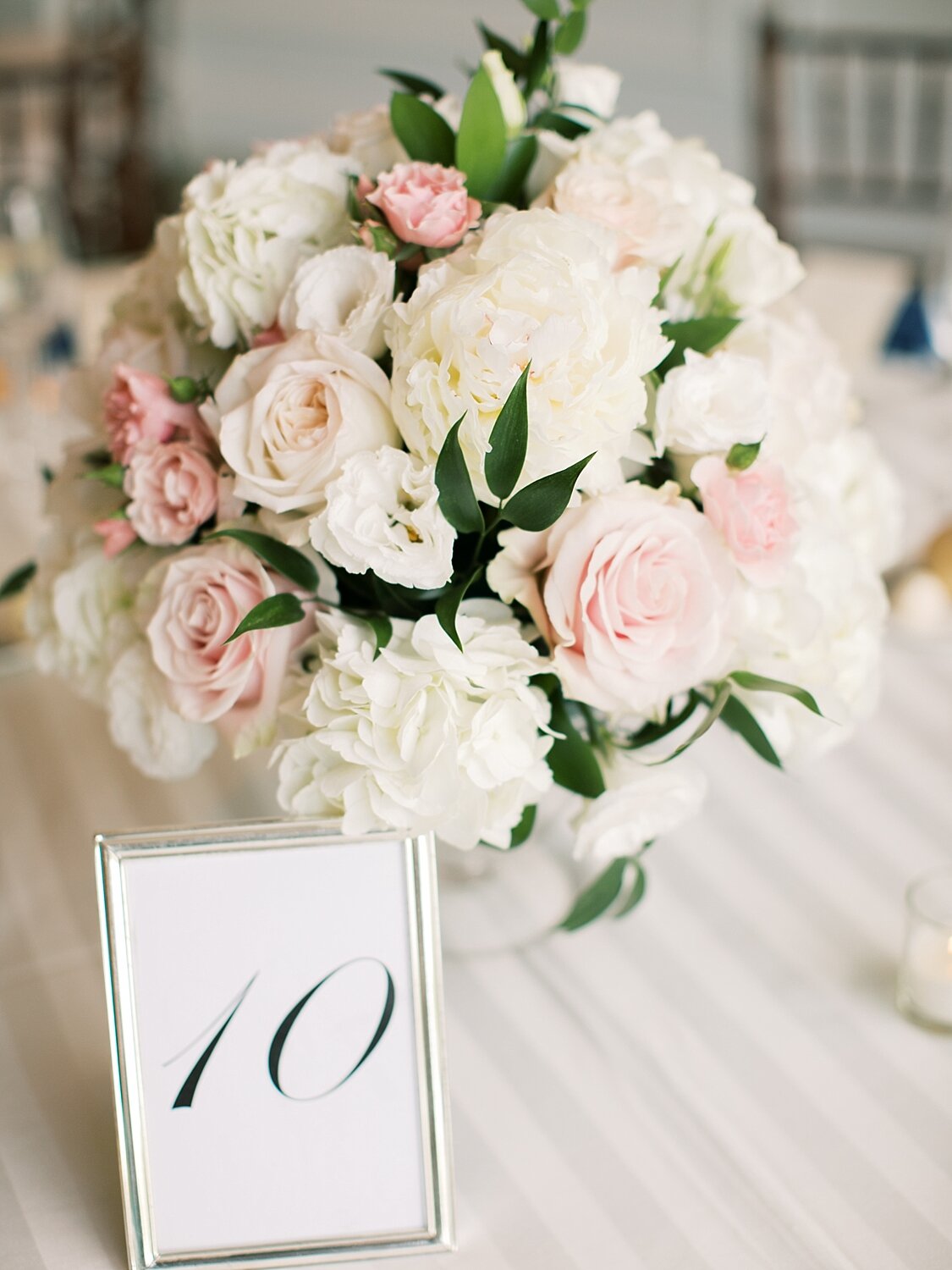 blush pink and ivory wedding centerpieces with Dramatic Innovations