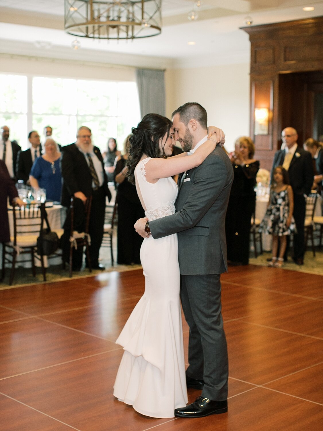 bride and groom dance during reception
