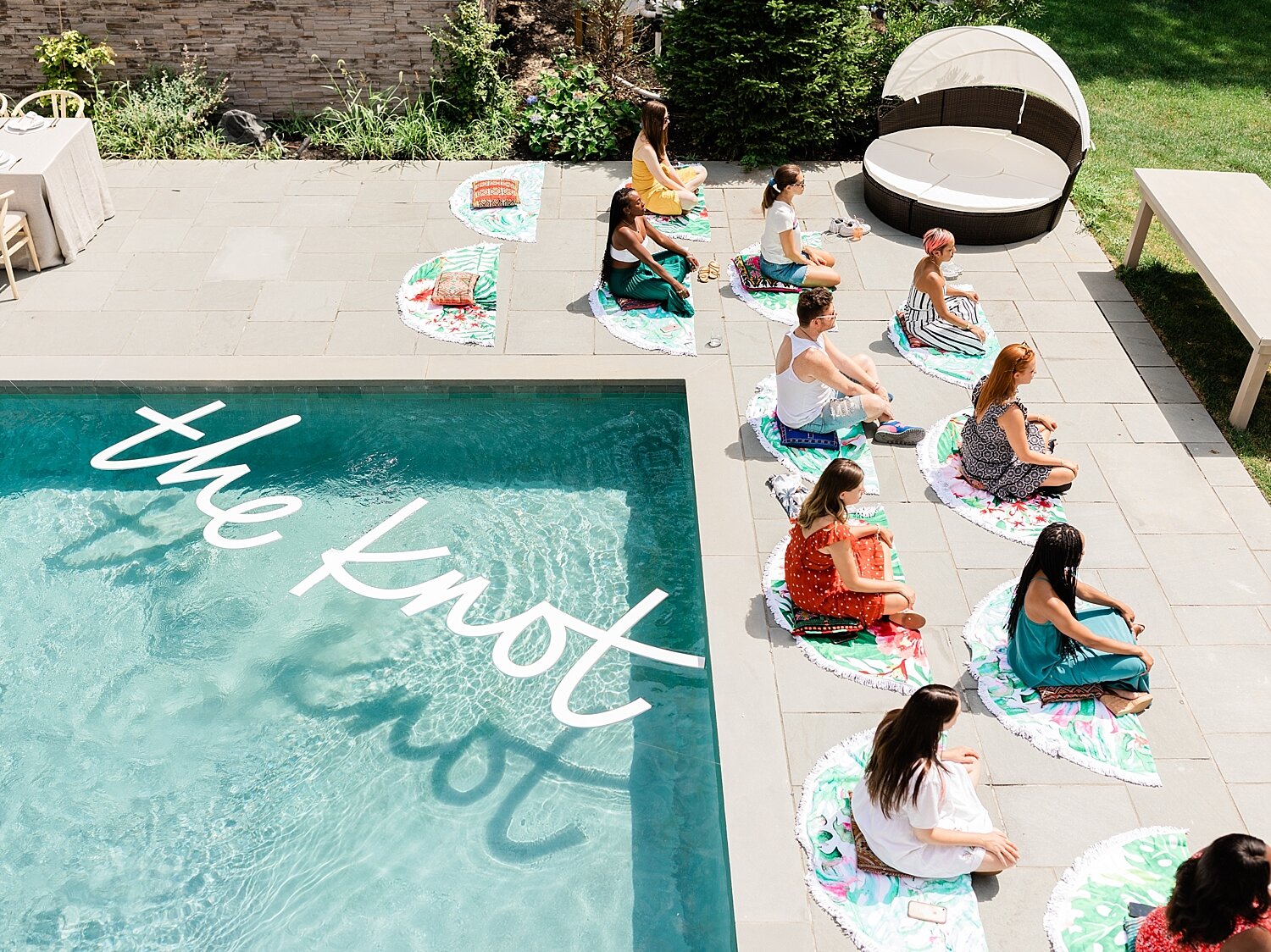 yoga by the pool during event with Bachelorette star Rachel Lindsay