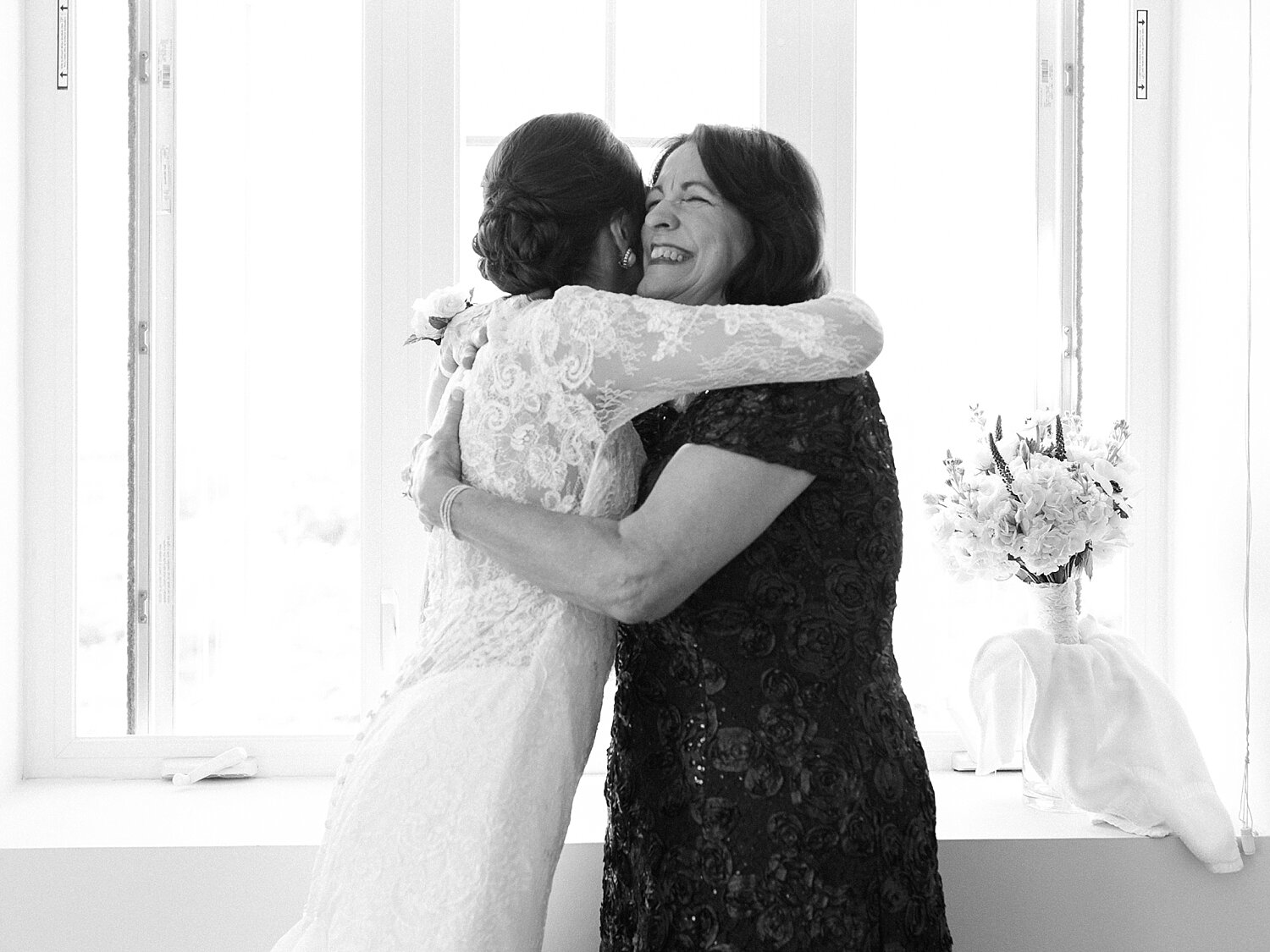 bride and mother prepare for wedding day in NY with Asher Gardner Photography