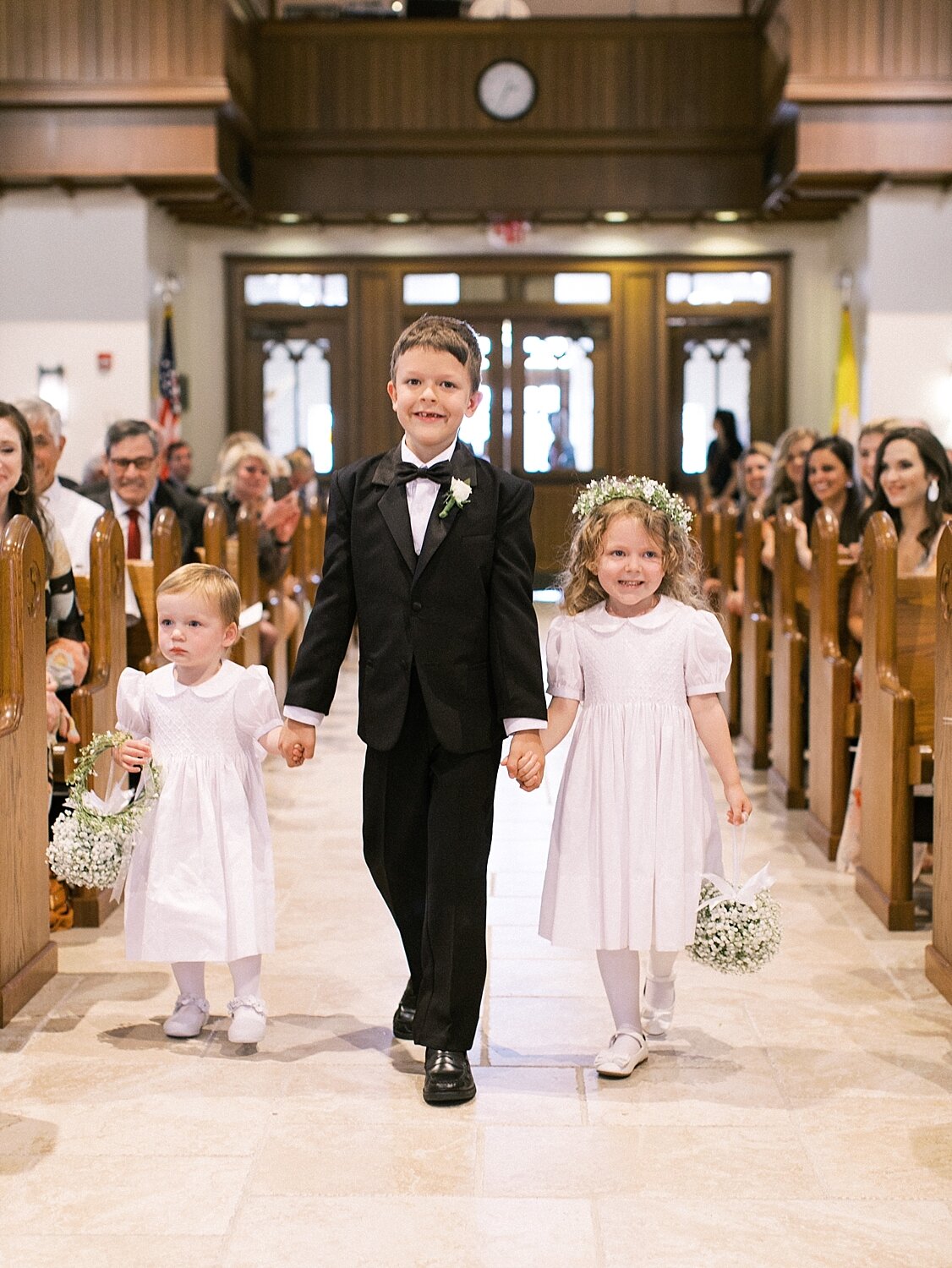 children enter church ceremony photographed by Asher Gardner Photography