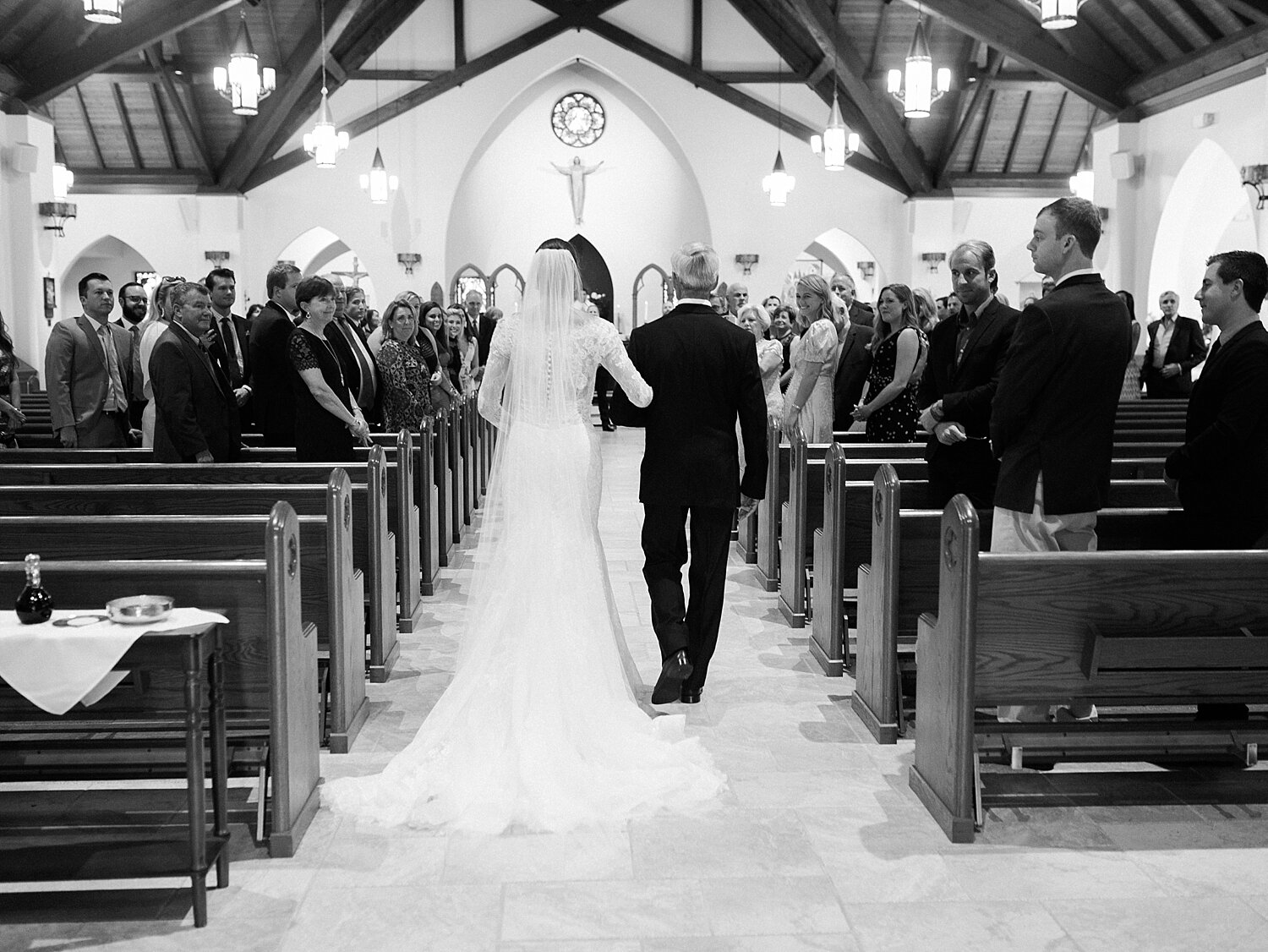 bride walks down the aisle with Asher Gardner Photography