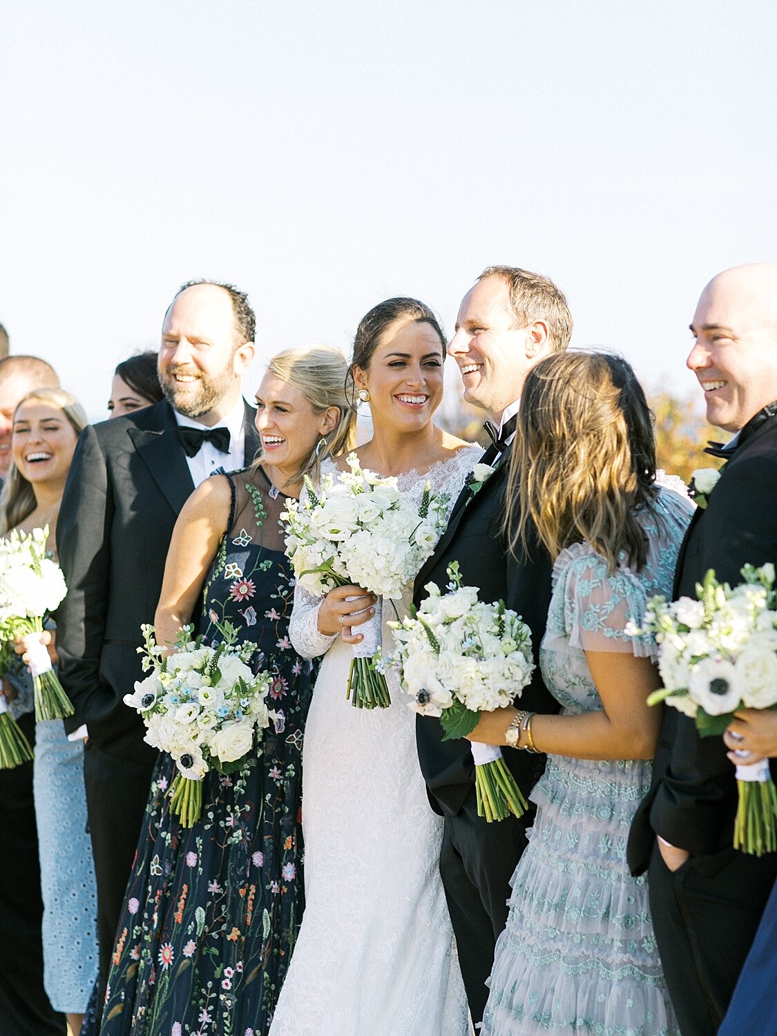 bridal party on beach of Montauk photographed by Asher Gardner Photography
