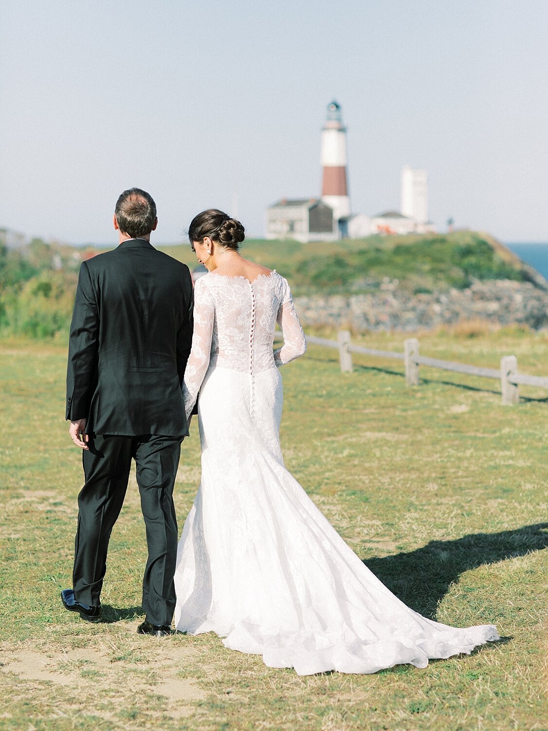 wedding portraits by Montauk lighthouse photographed by Asher Gardner Photography