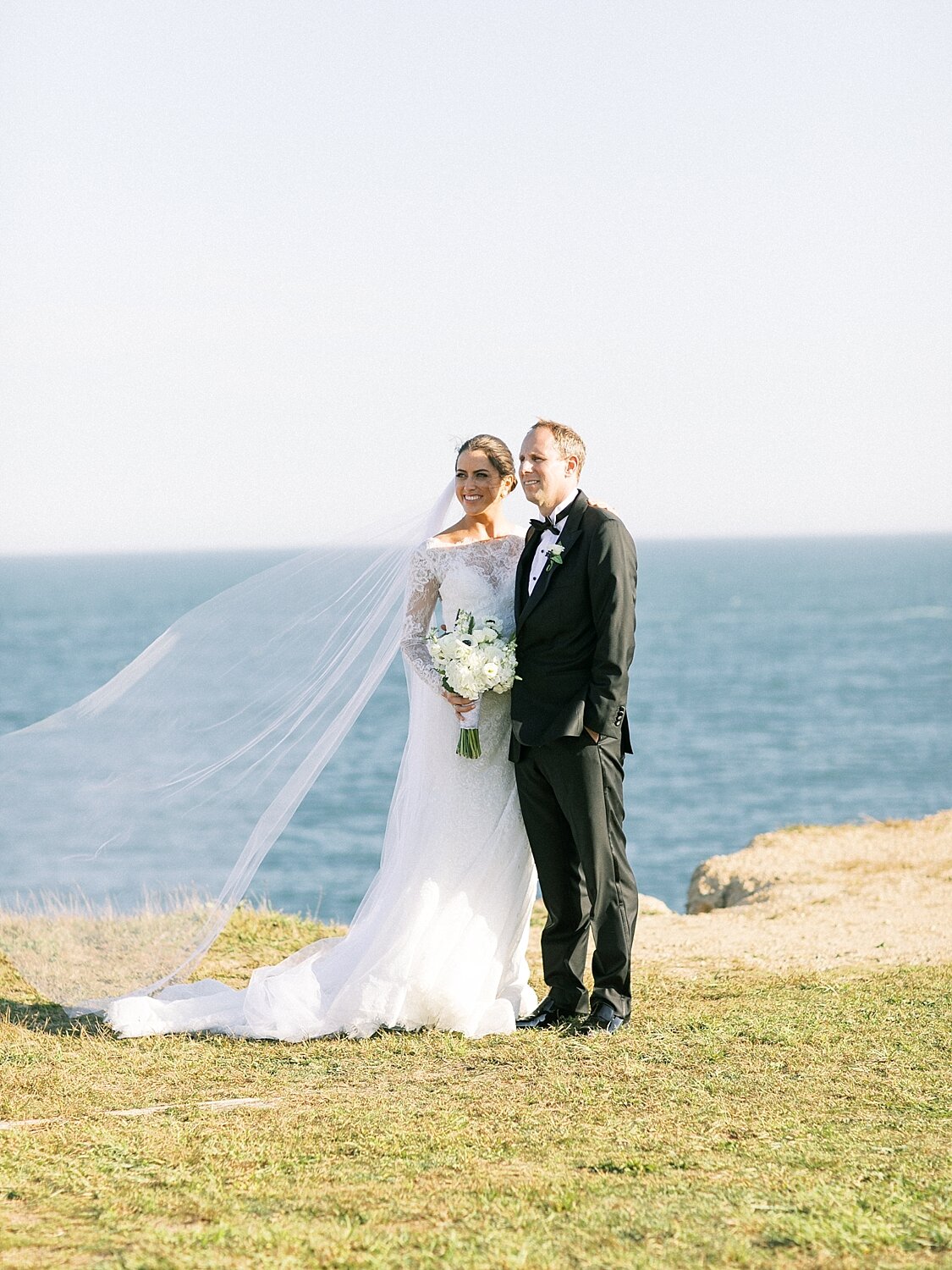 bride and groom pose in Montauk with Asher Gardner Photography