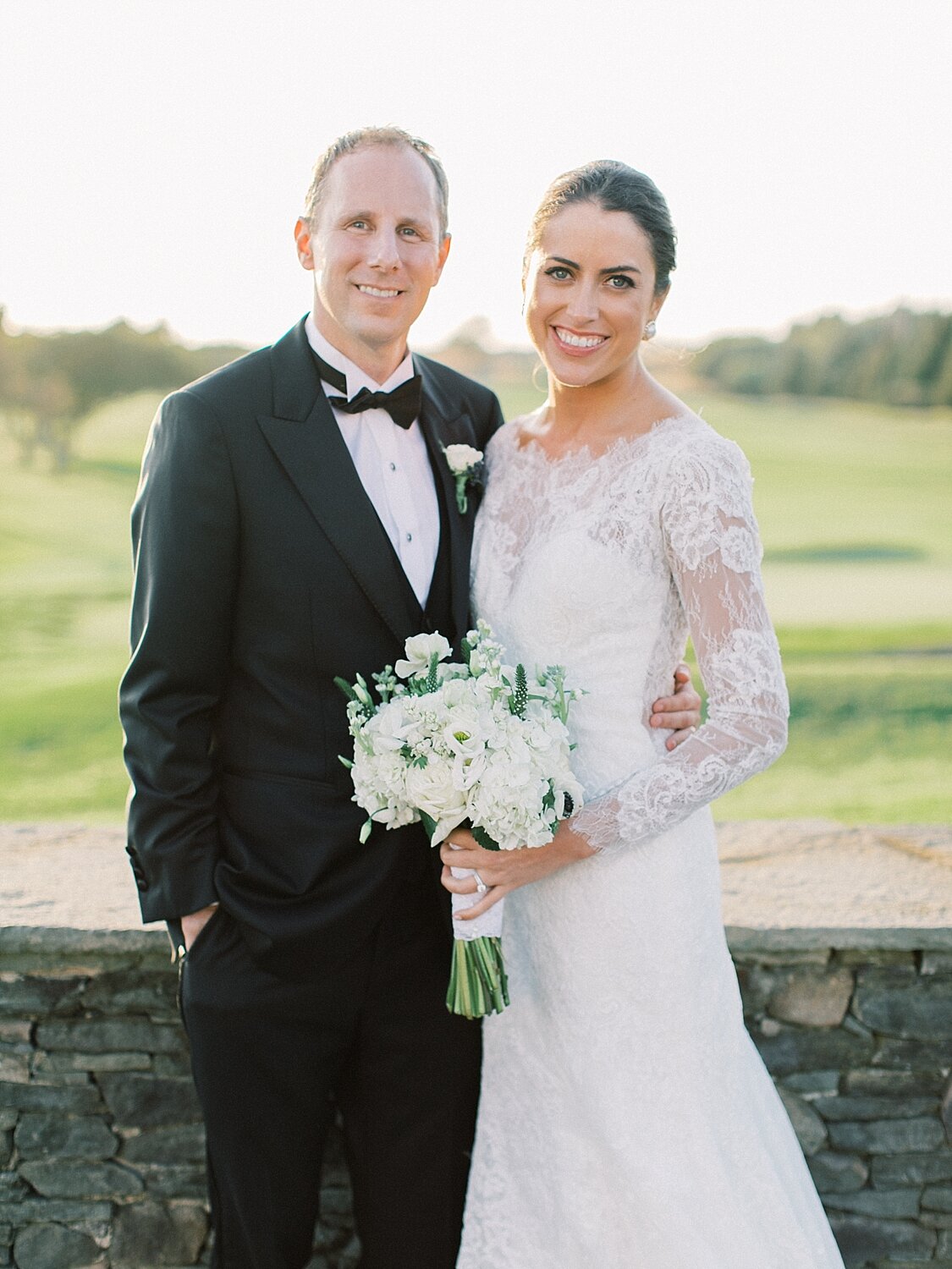 bride and groom on Montauk beach with Asher Gardner Photography