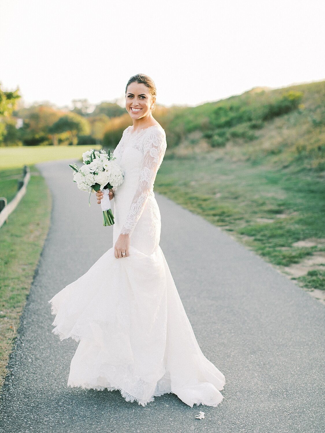 bride poses for Asher Gardner Photography in Montauk NY