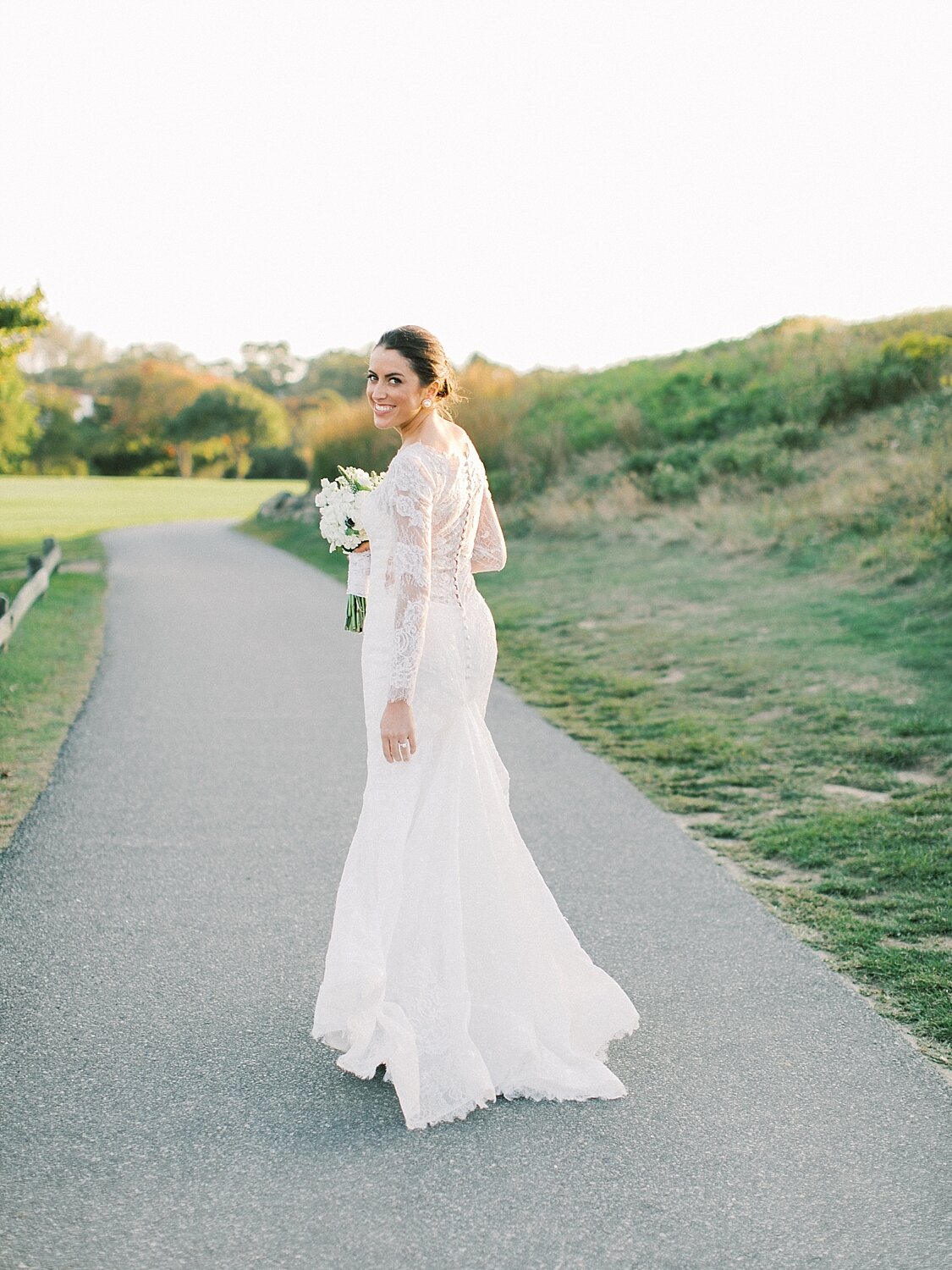 bridal portrait on golf course with Asher Gardner Photography