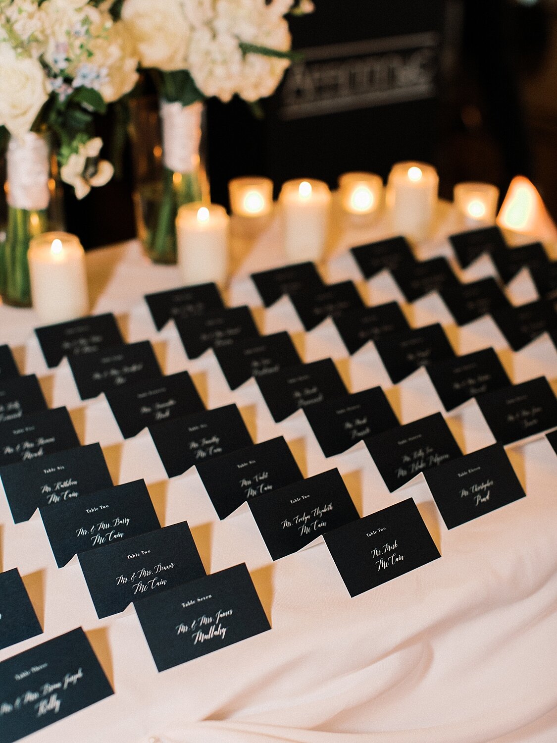 black escort cards photographed by Asher Gardner Photography