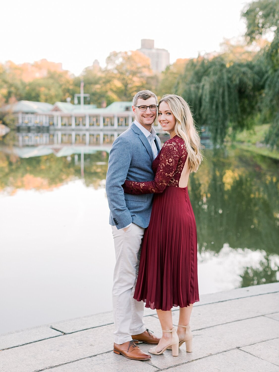 Engagement photos in Central Park by the boathouse with Asher Gardner Photography