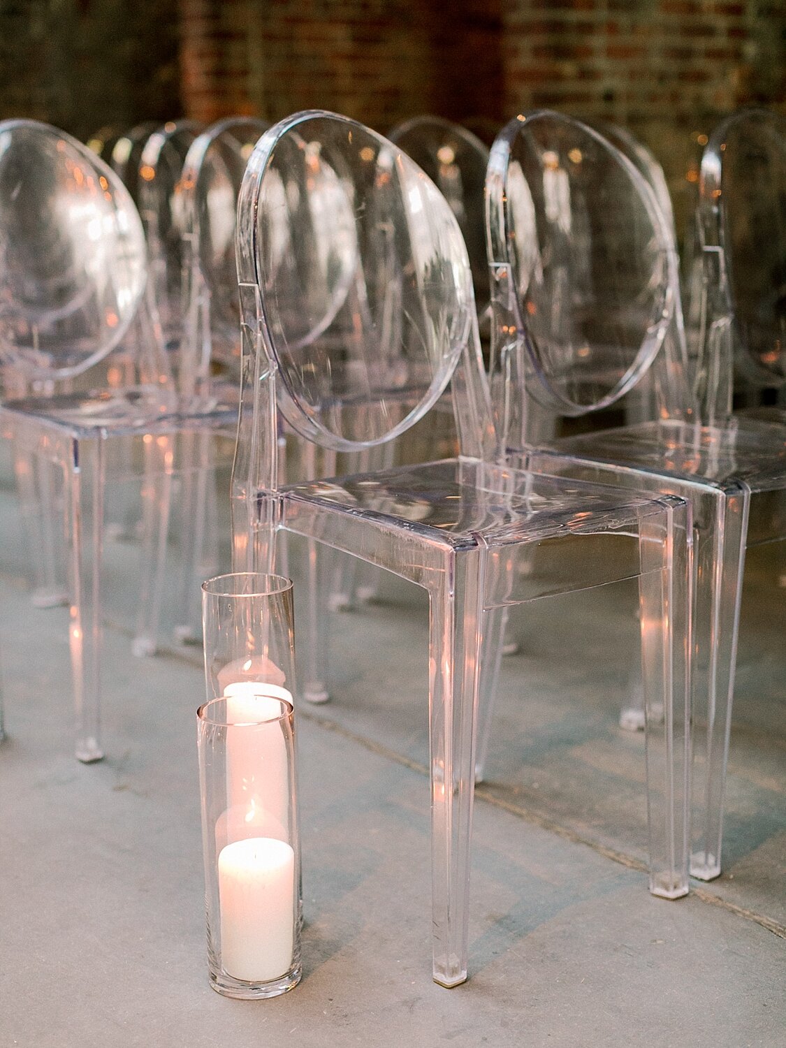 clear chairs for modern wedding ceremony with Asher Gardner Photography