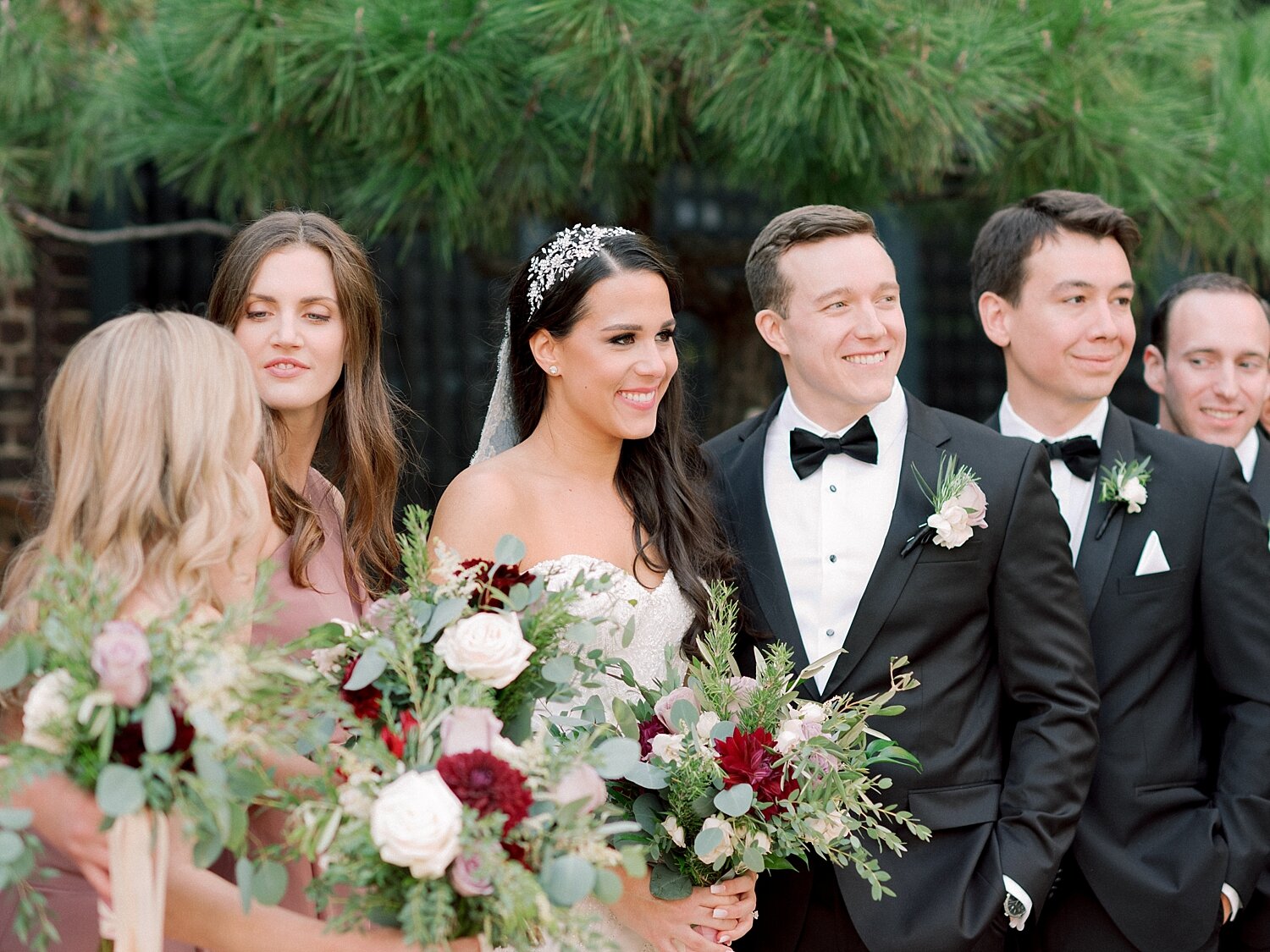 bride and groom pose with wedding party photographed by Asher Gardner Photography