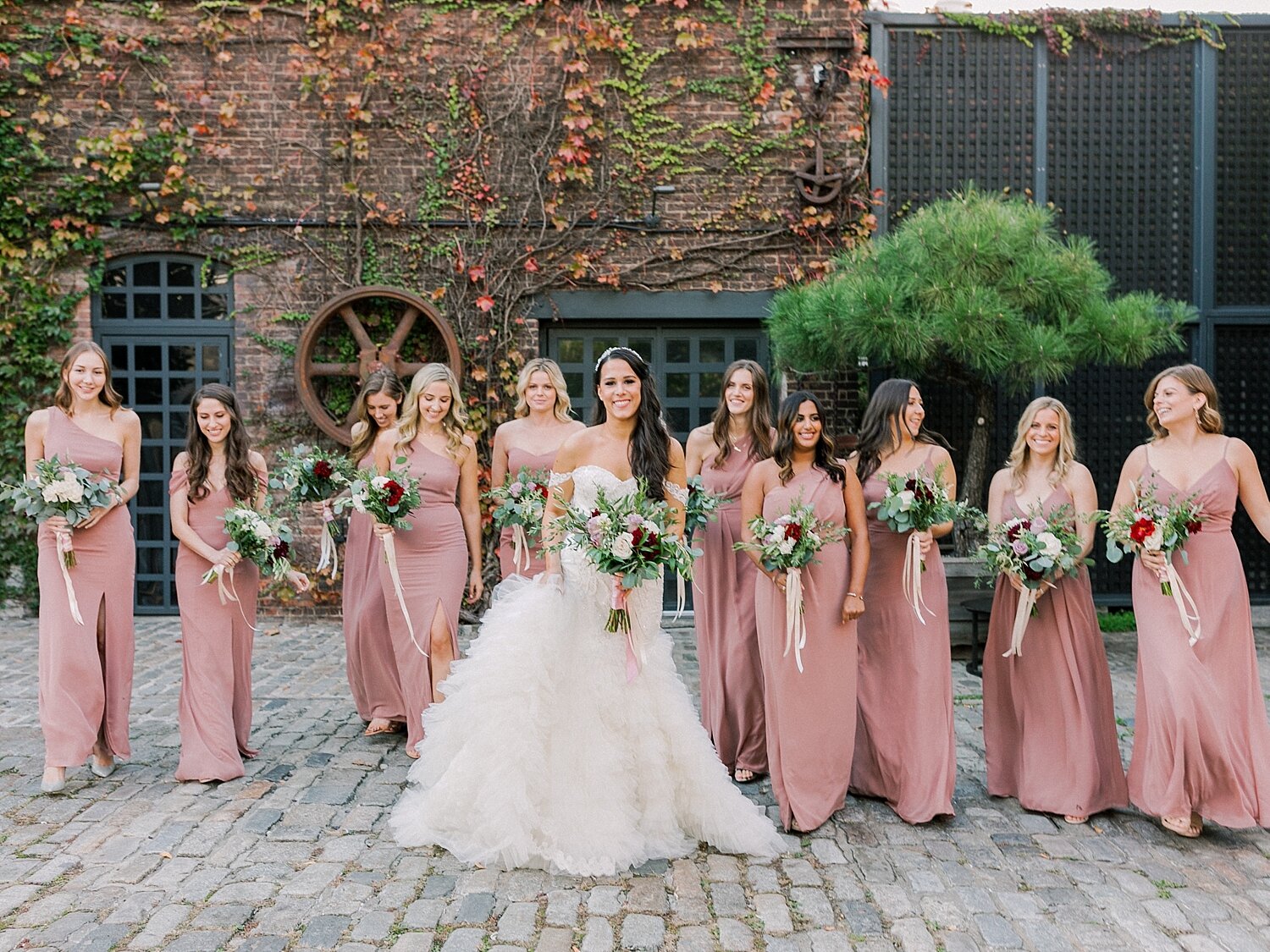 bridesmaids in pale pink gowns from Dessy Group photographed by Asher Gardner Photography