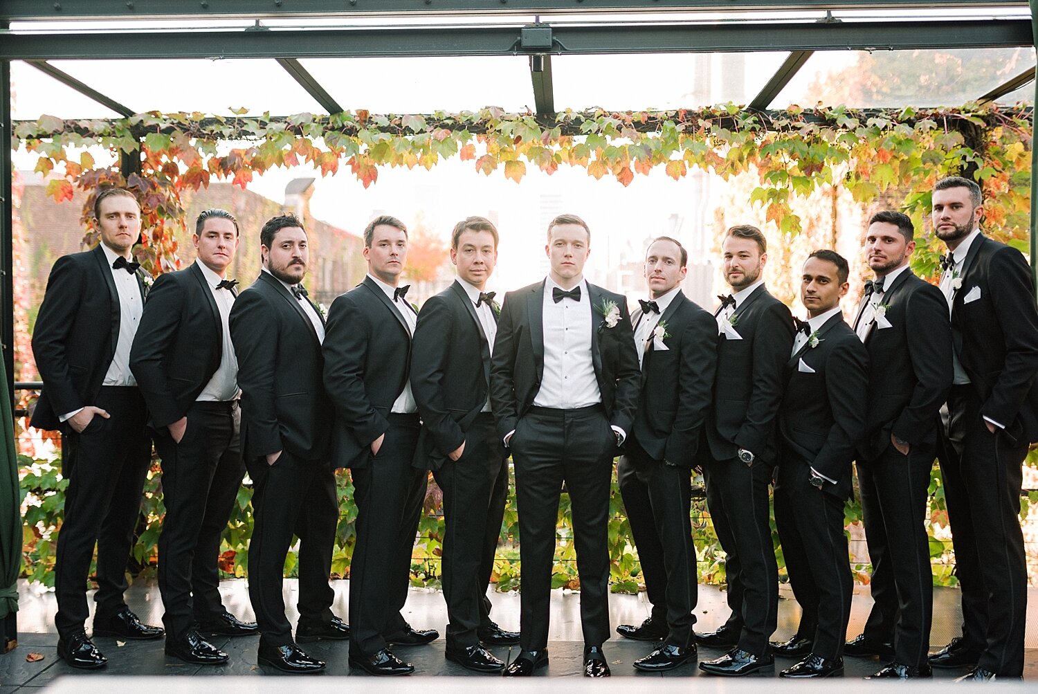 groomsmen pose for wedding photos with Asher Gardner Photography