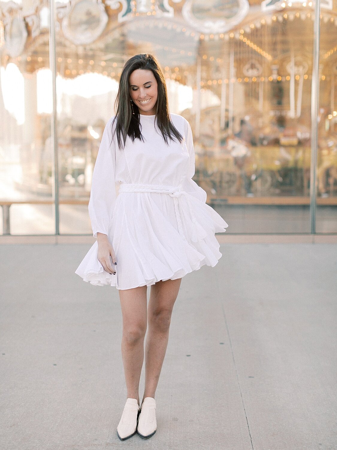 engagement portrait with twirling dress photographed by Asher Gardner Photography