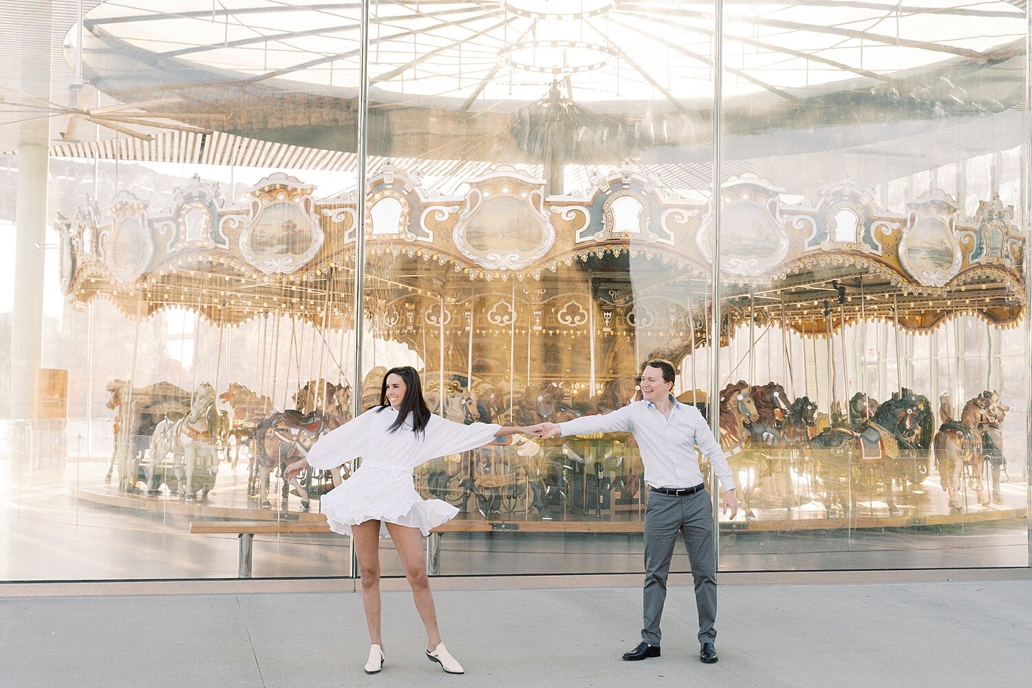 engagement portraits with NYC carousel with Asher Gardner Photography
