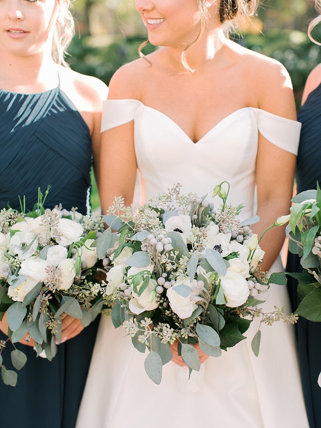 bouquets with ivory florals by Jack and Rose Florist