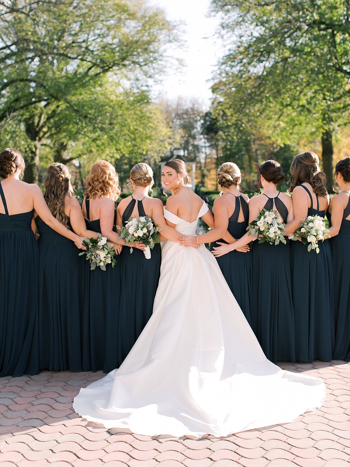bridesmaids in Azazie gowns pose for Asher Gardner Photography