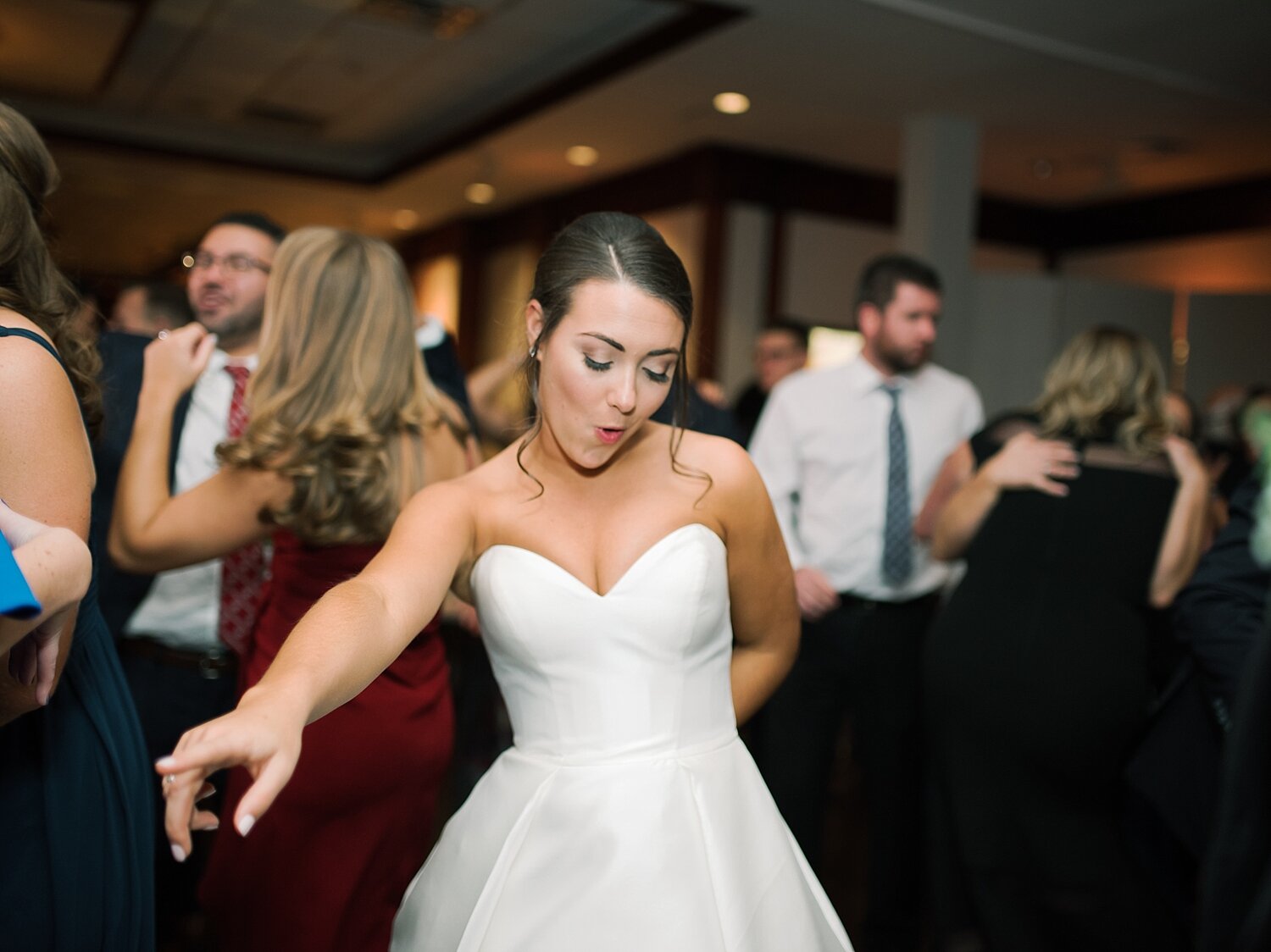 bride dances at Long Island wedding reception with Asher Gardner Photography