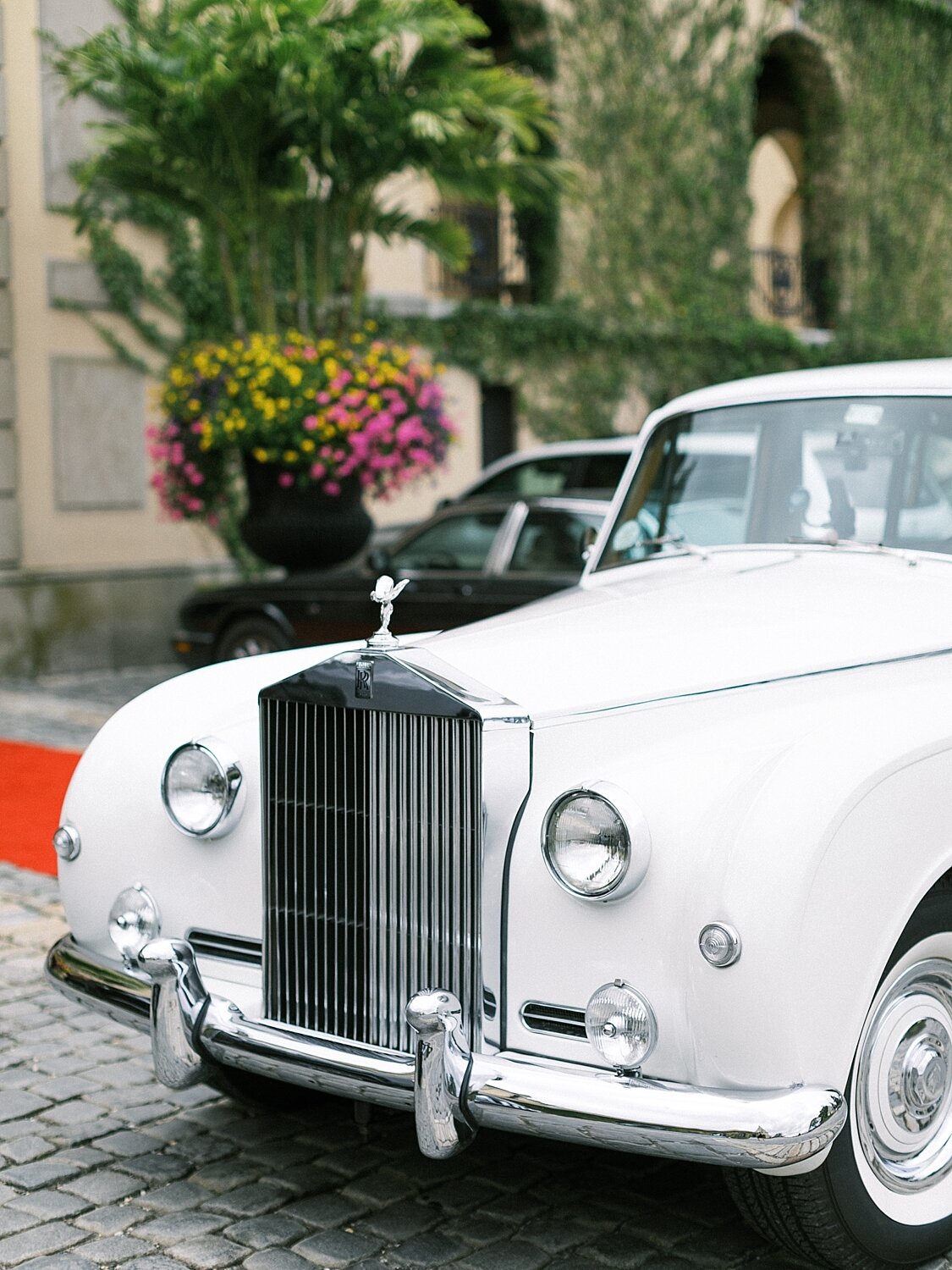 classic car outside Oheka Castle for bride with Asher Gardner Photography