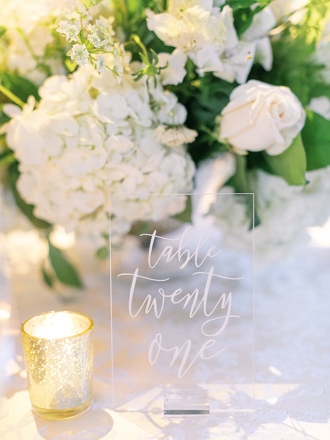 wedding reception with all white florals at Oheka Castle photographed by Asher Gardner Photography