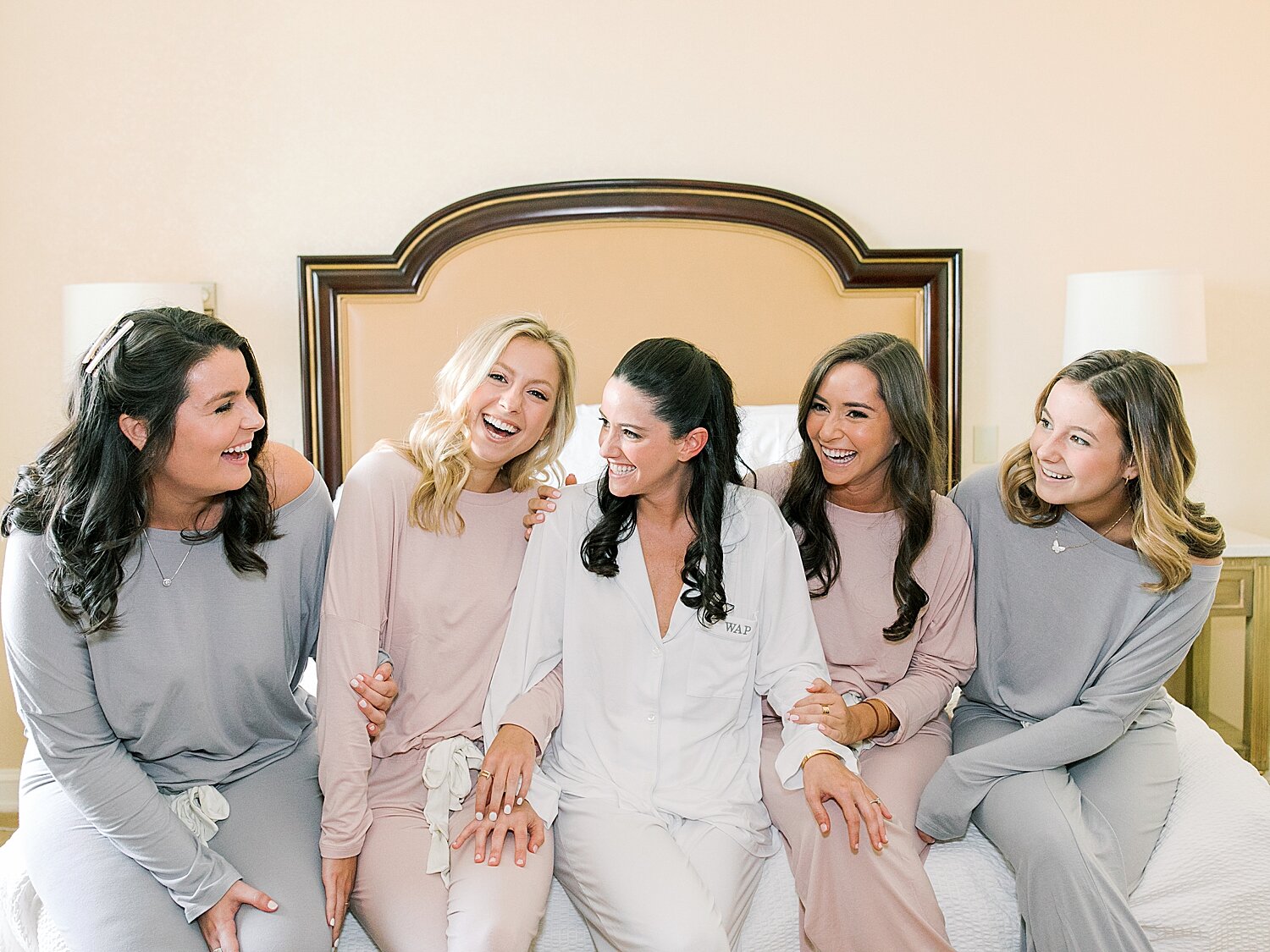 bride and bridesmaids prepare for at home wedding | Stylish Private Home Wedding Inspiration | Asher Gardner Photography