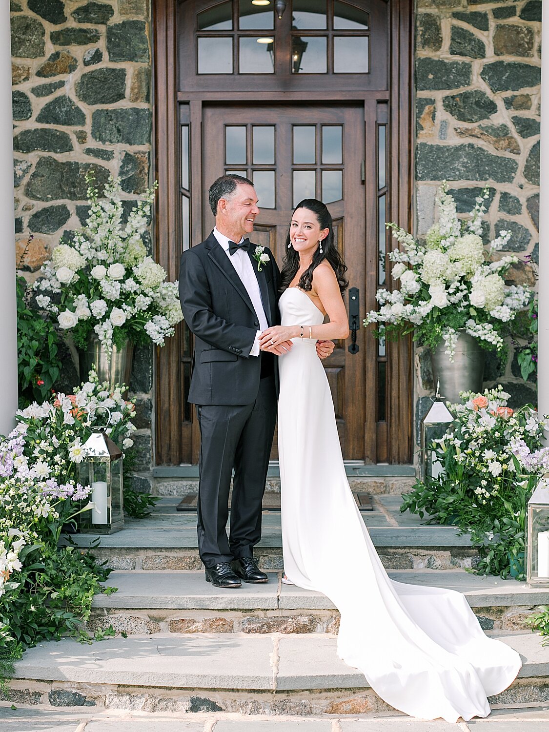 bride and dad pose on front steps on wedding day | Stylish Private Home Wedding Inspiration | Asher Gardner Photography