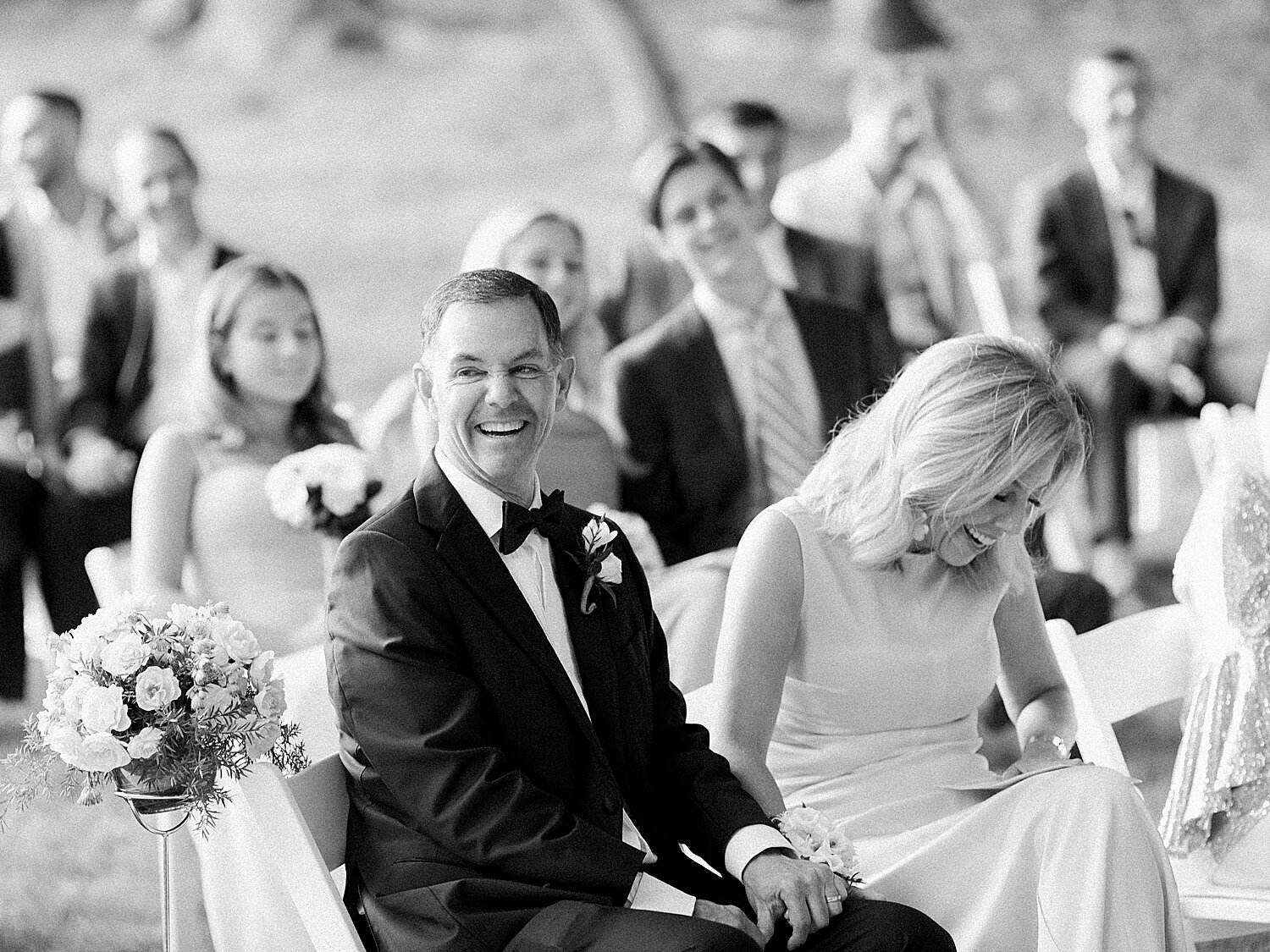 parents laugh during wedding ceremony  | Stylish Private Home Wedding Inspiration | Asher Gardner Photography