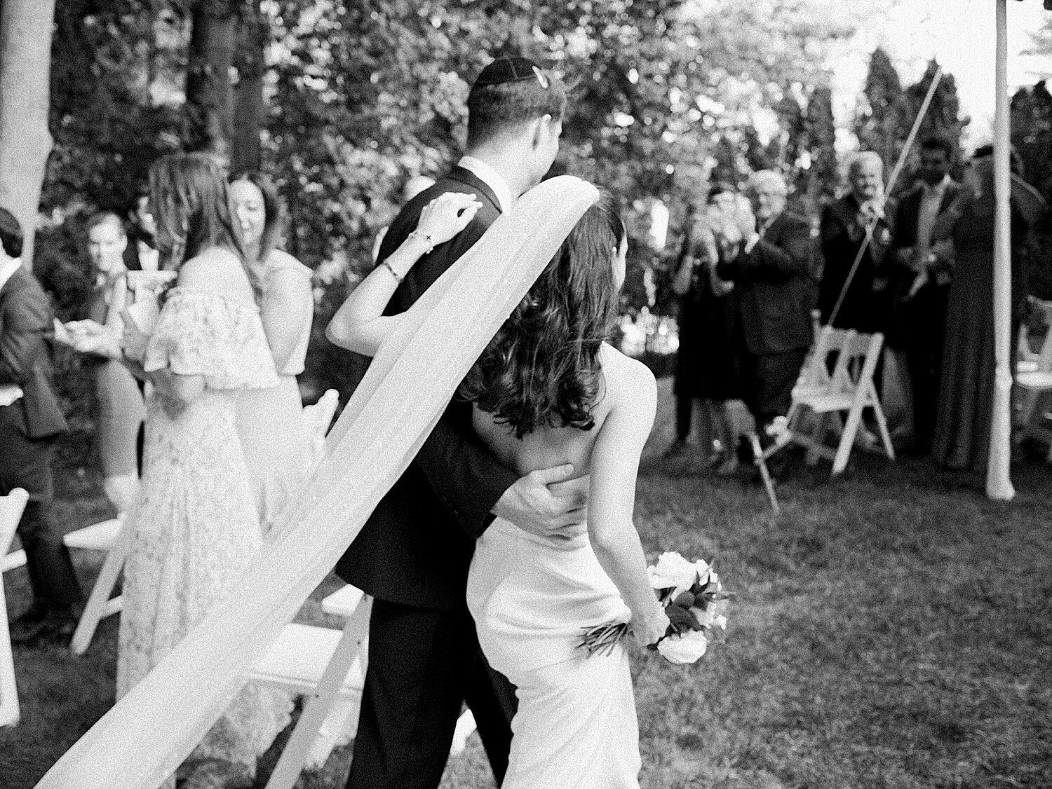 bride and groom walk up aisle after wedding ceremony | Stylish Private Home Wedding Inspiration | Asher Gardner Photography