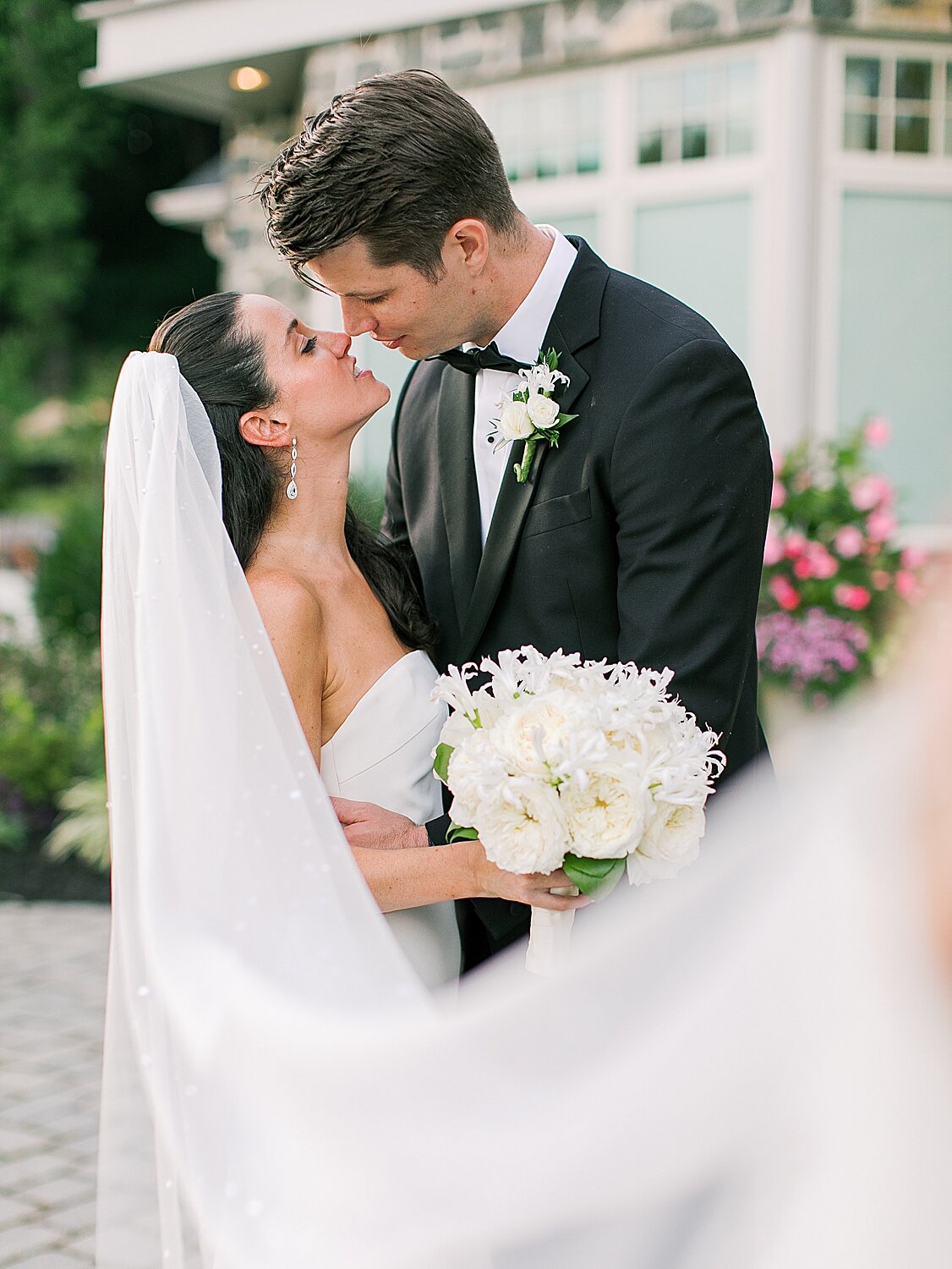 newlyweds kiss after wedding ceremony | Stylish Private Home Wedding Inspiration | Asher Gardner Photography