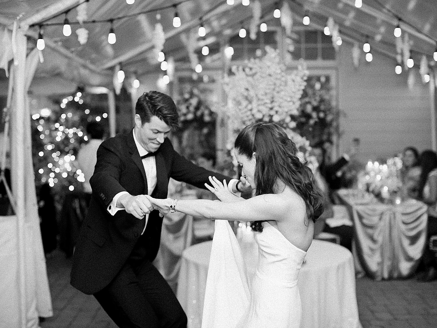 bride and groom dance during patio reception | Stylish Private Home Wedding Inspiration | Asher Gardner Photography