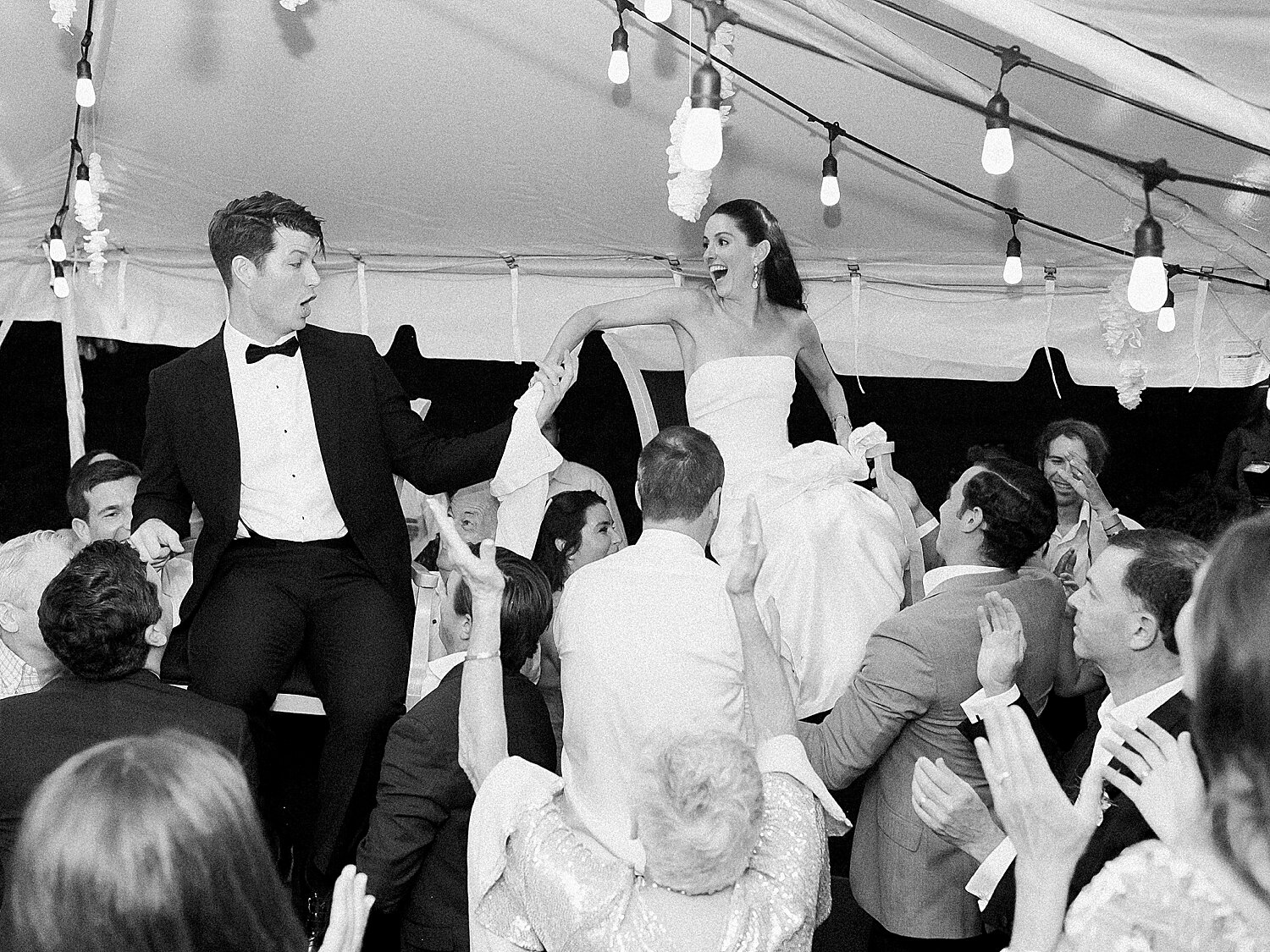 traditional Jewish wedding dance on chairs | Stylish Private Home Wedding Inspiration | Asher Gardner Photography