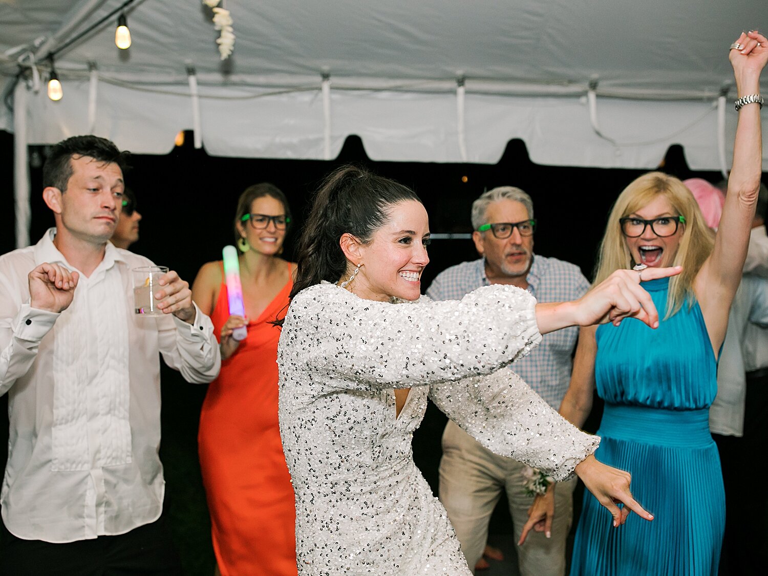 bride dances during wedding reception | Stylish Private Home Wedding Inspiration | Asher Gardner Photography