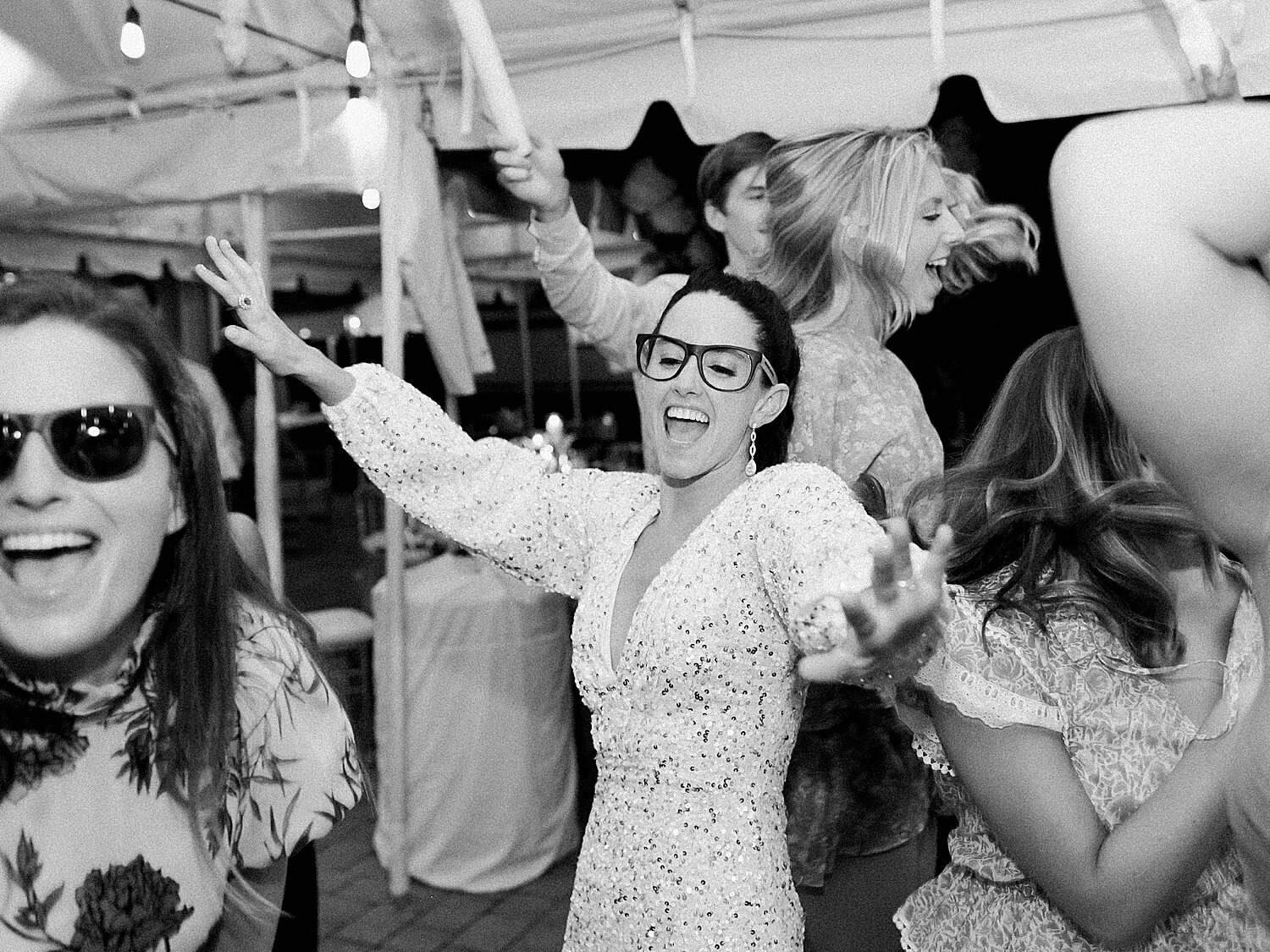 bride dances during wedding reception | Stylish Private Home Wedding Inspiration | Asher Gardner Photography