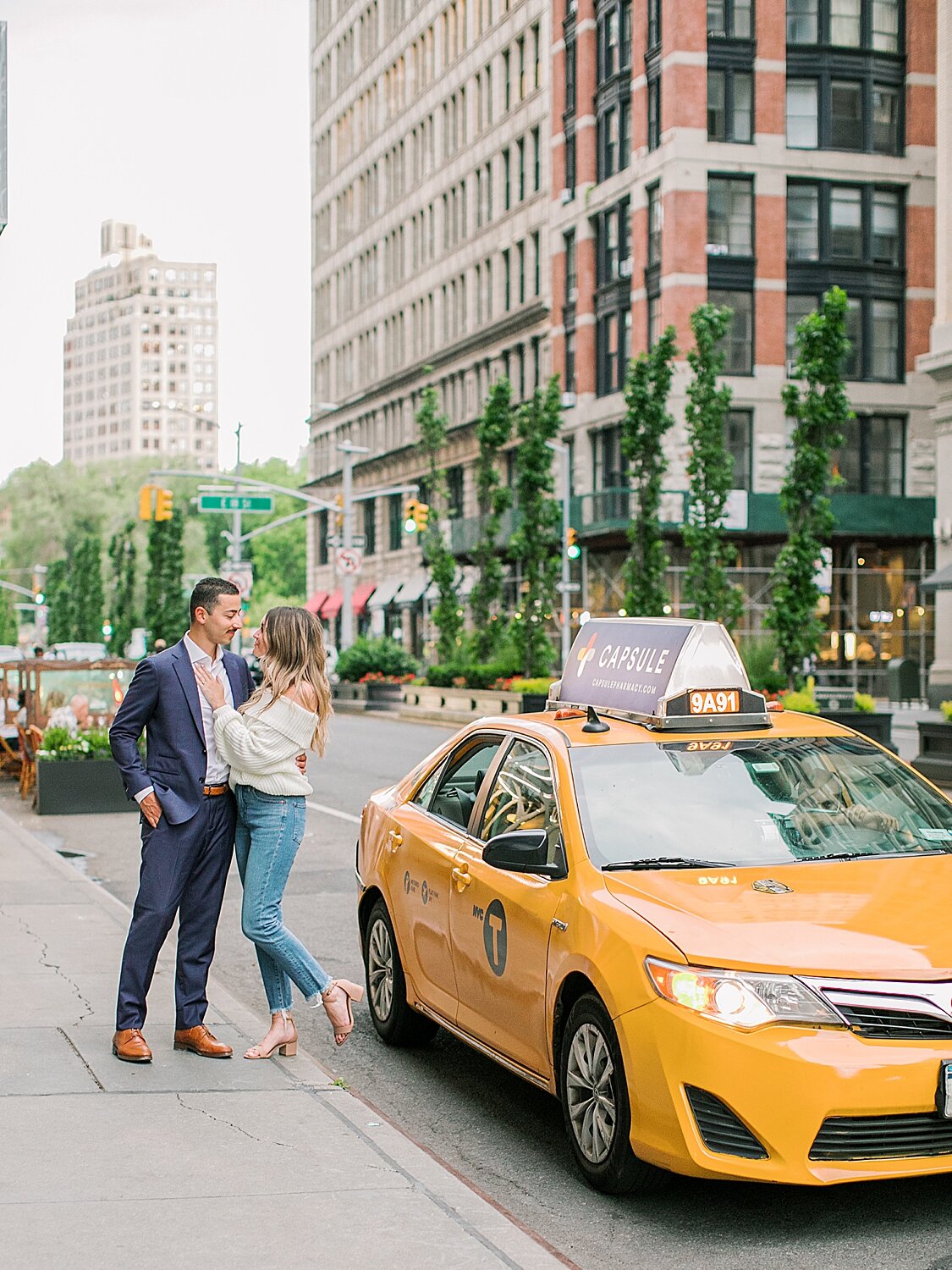 New York City taxi with engaged couple | Asher Gardner Photography | The Village engagement session