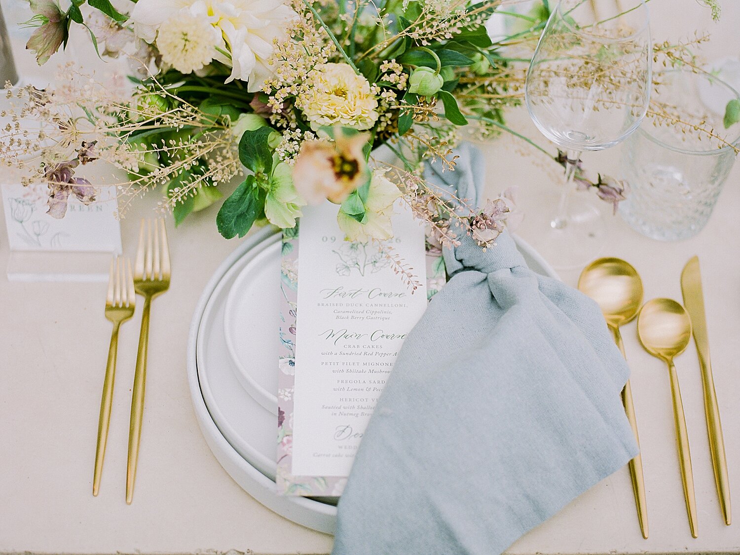 place settings with blue and gold details | Asher Gardner Photography | Intimate Ceremony in DUMBO New York