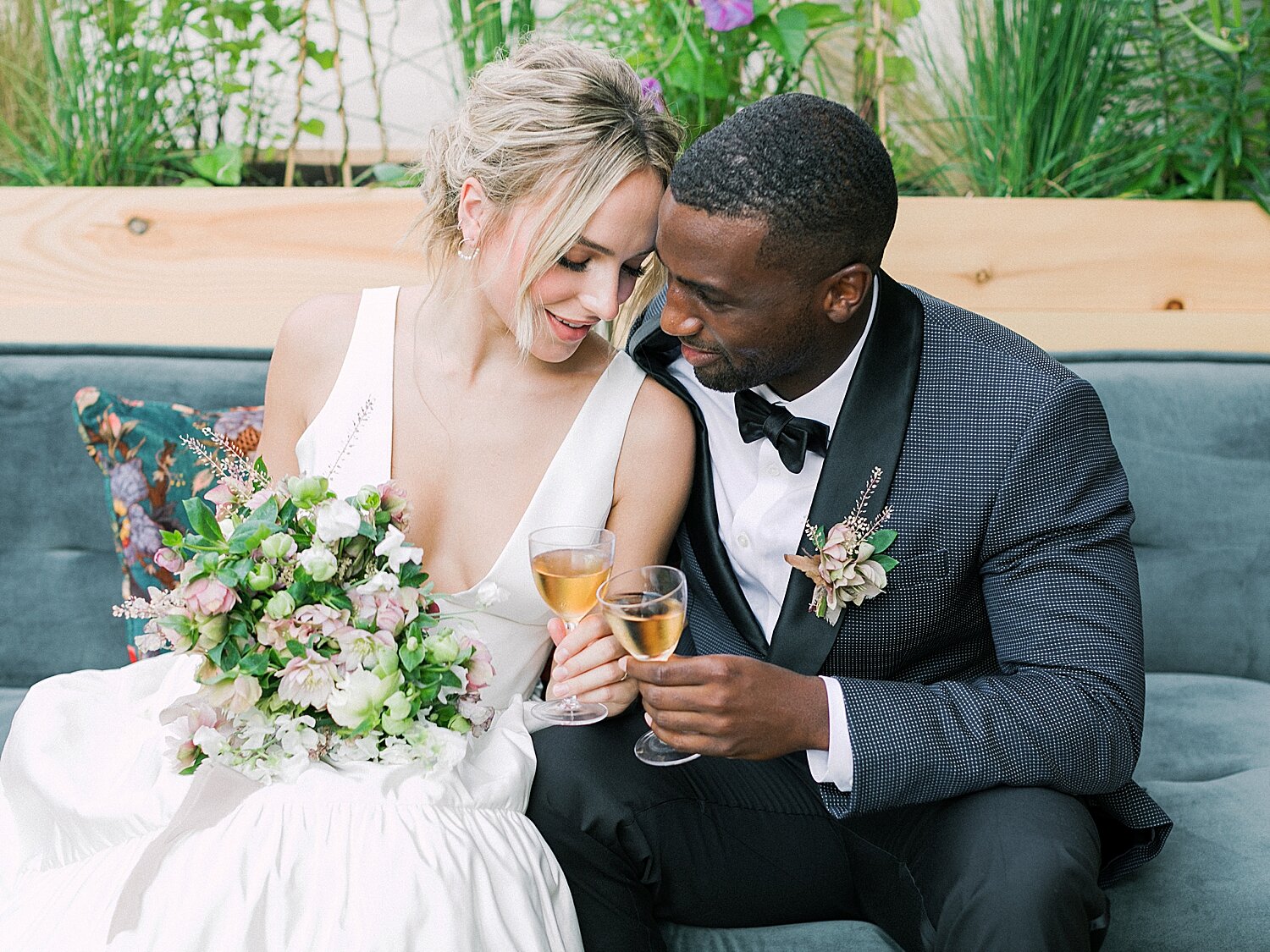 newlyweds sit during reception at Celestine | Asher Gardner Photography | Intimate Ceremony in DUMBO New York
