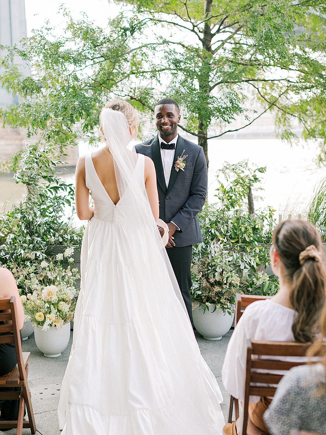 groom sees bride for the first time on NYC wedding day | Asher Gardner Photography | Intimate Ceremony in DUMBO New York